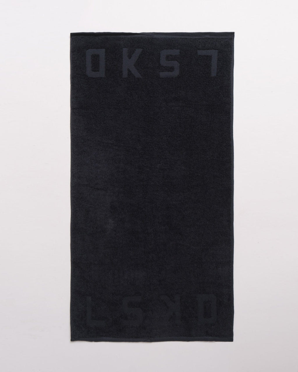 Model wearing Layer Towel - Black