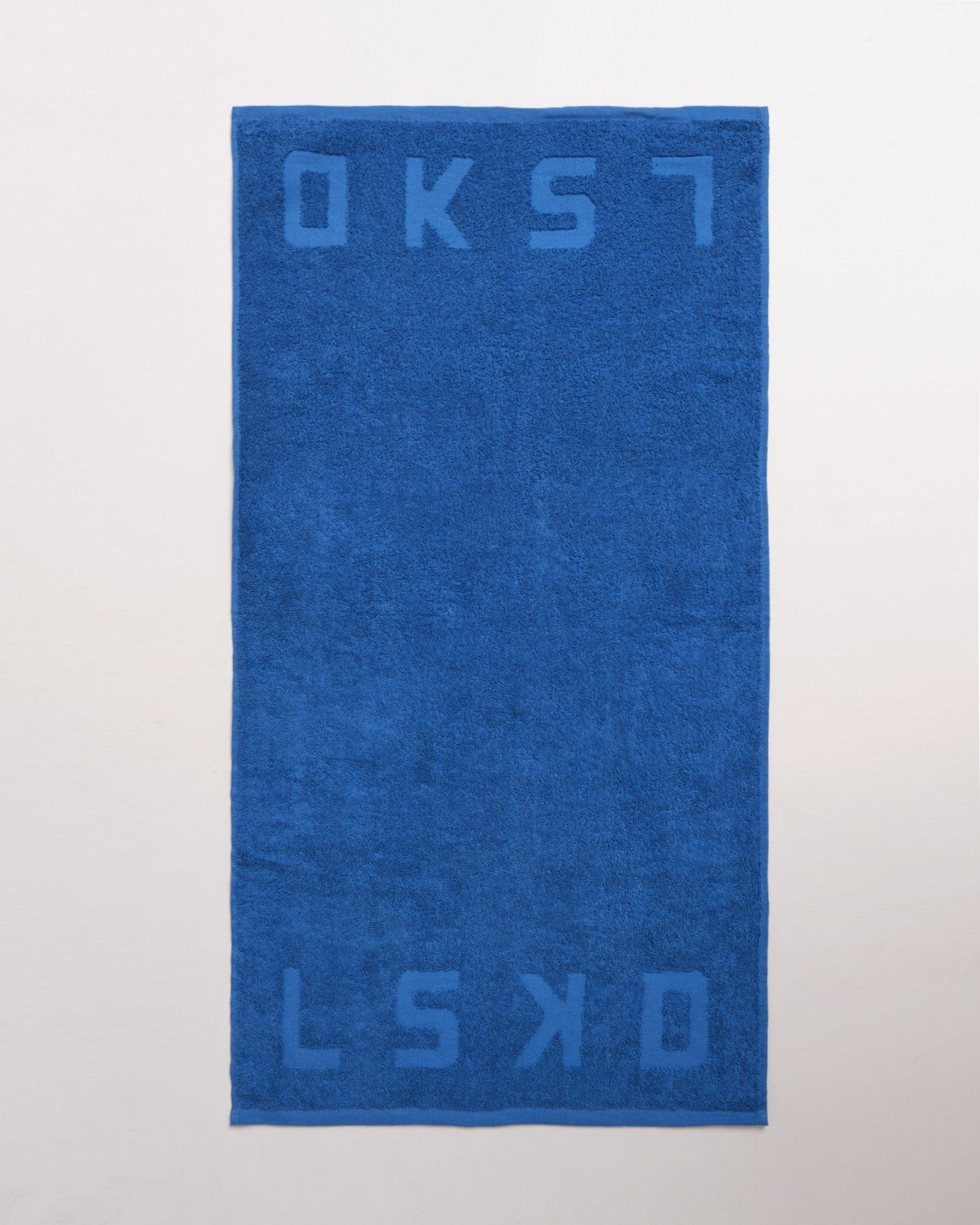 Model wearing Layer Towel - Turkish Sea