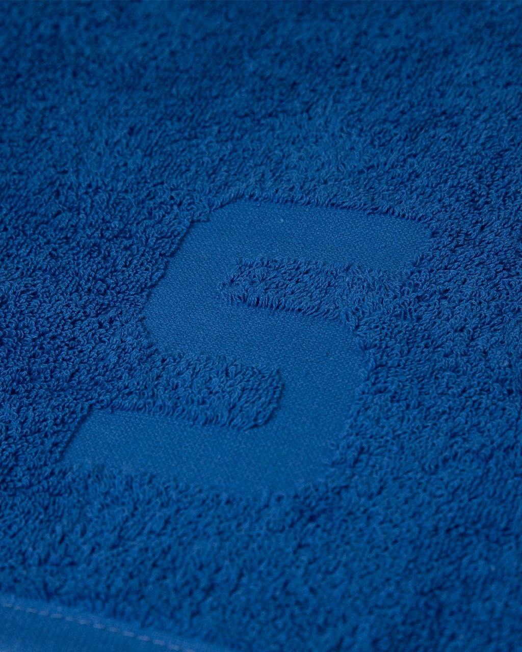 Model wearing Layer Towel - Turkish Sea