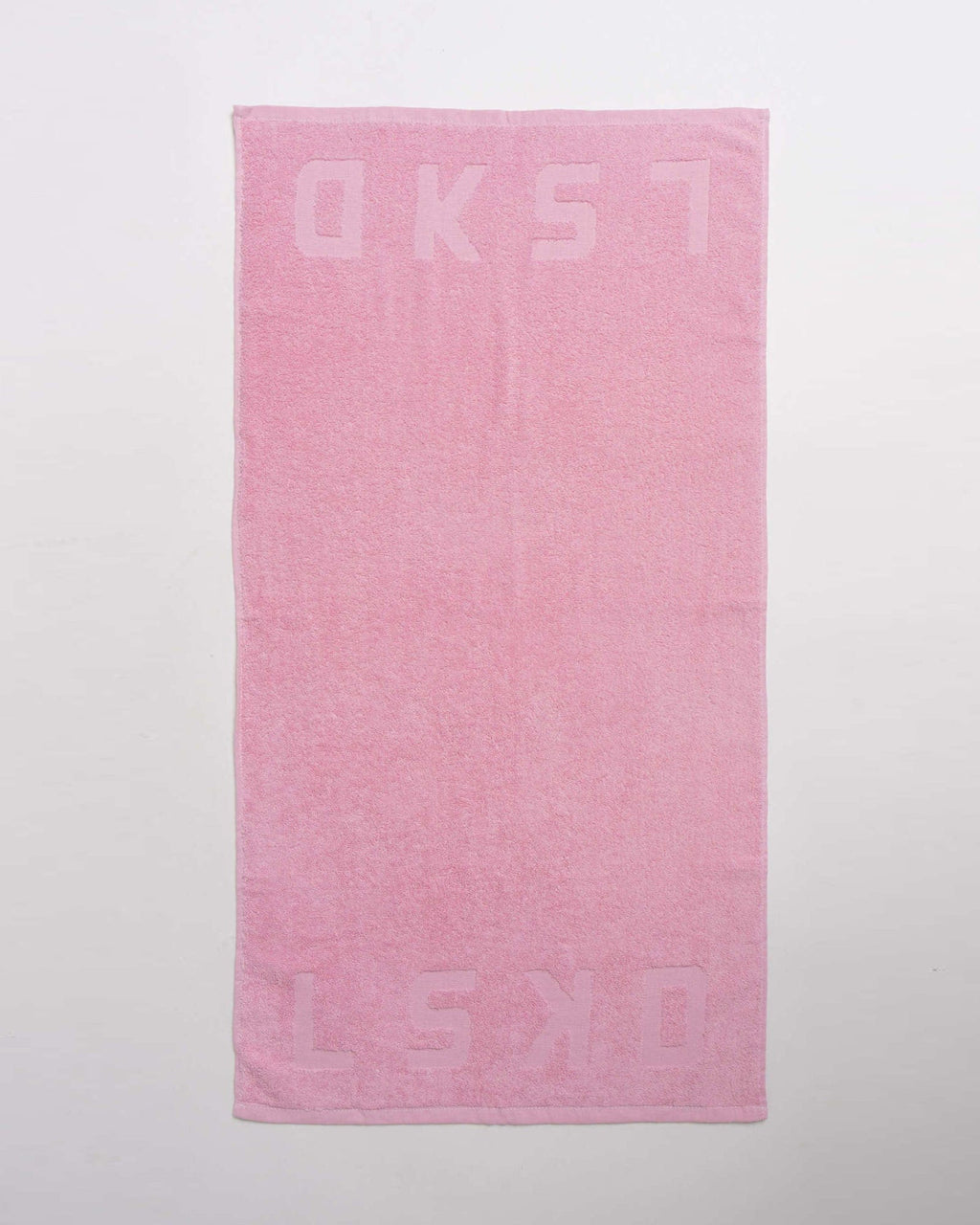 Model wearing Layer Towel - Petal Pink