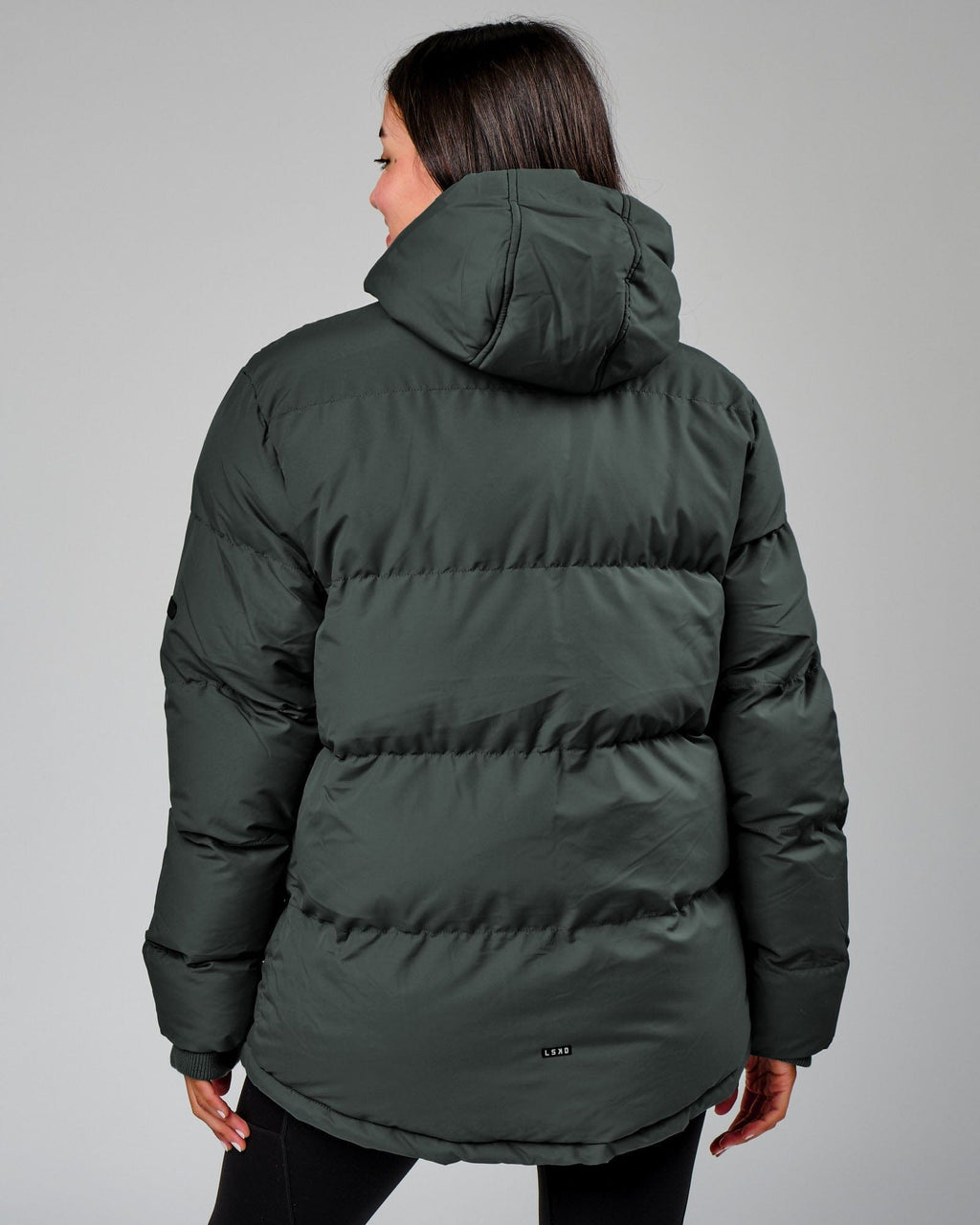 Model wearing Unisex Roasted Puffer Jacket Oversize 22 - Carbon Green
