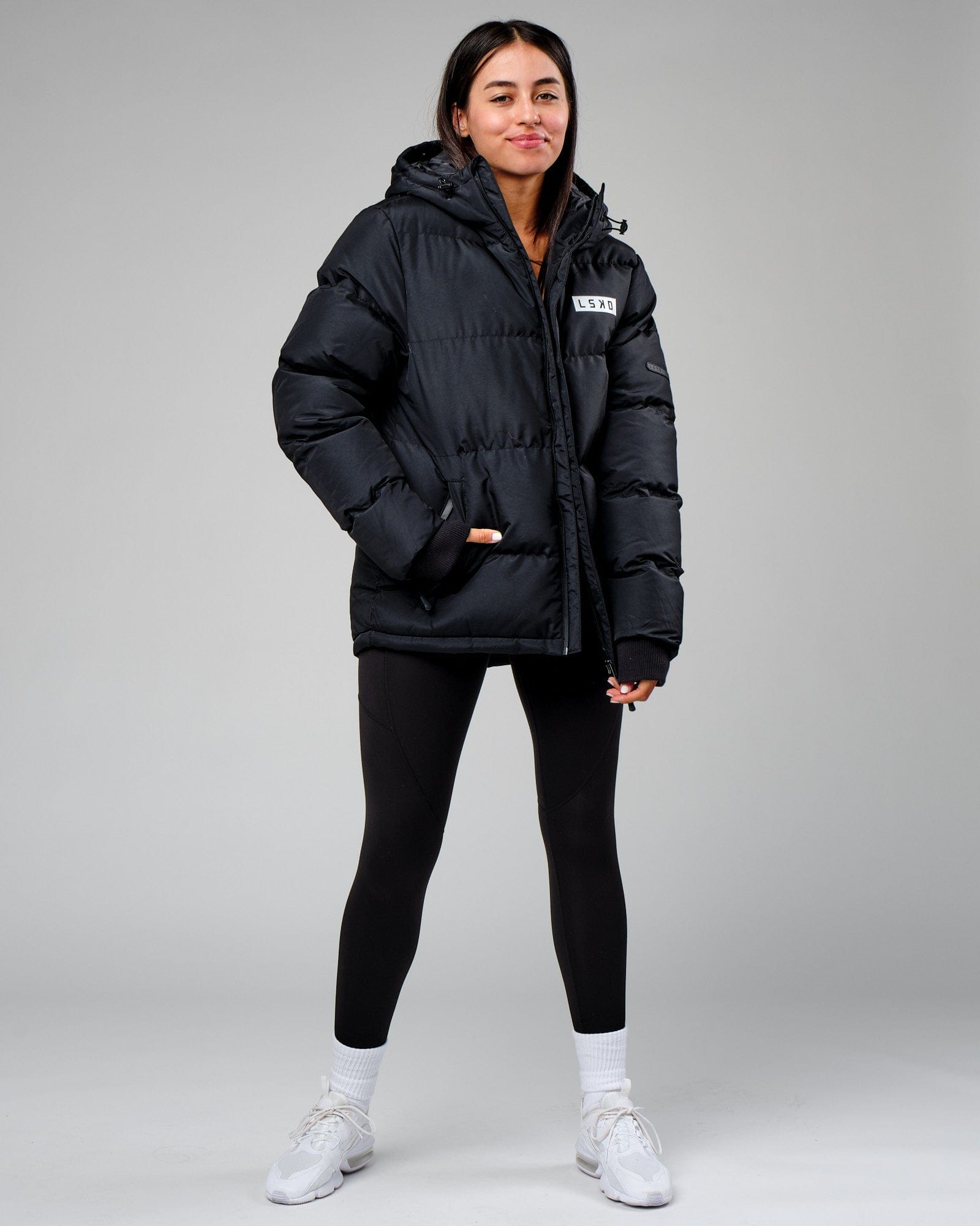 Model wearing Unisex Roasted Puffer Jacket Oversize 22 - Black