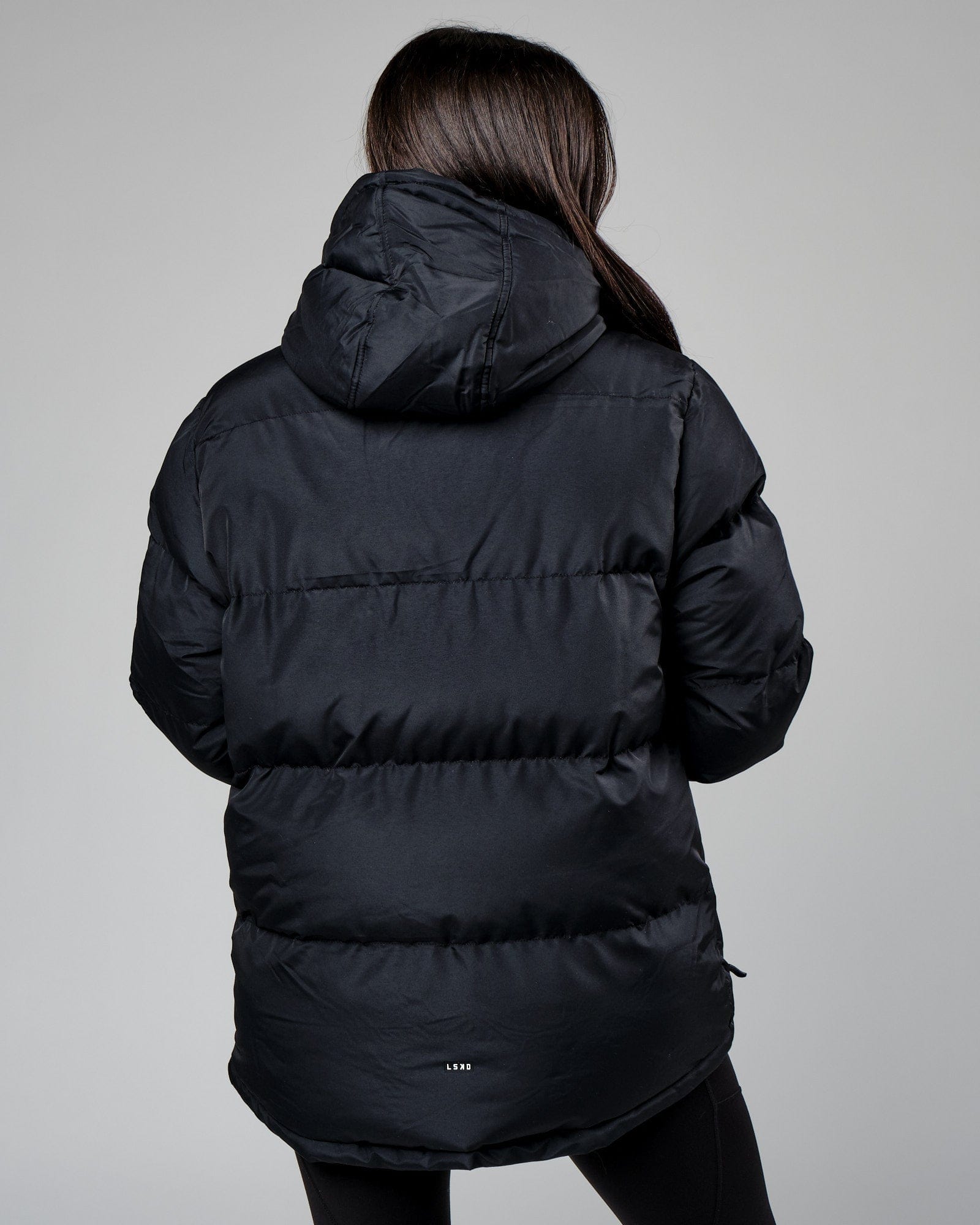 Model wearing Unisex Roasted Puffer Jacket Oversize 22 - Black