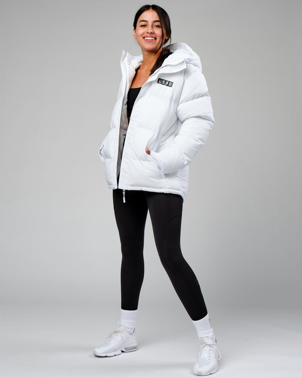 Model wearing Unisex Roasted Puffer Jacket Oversize 22 - White