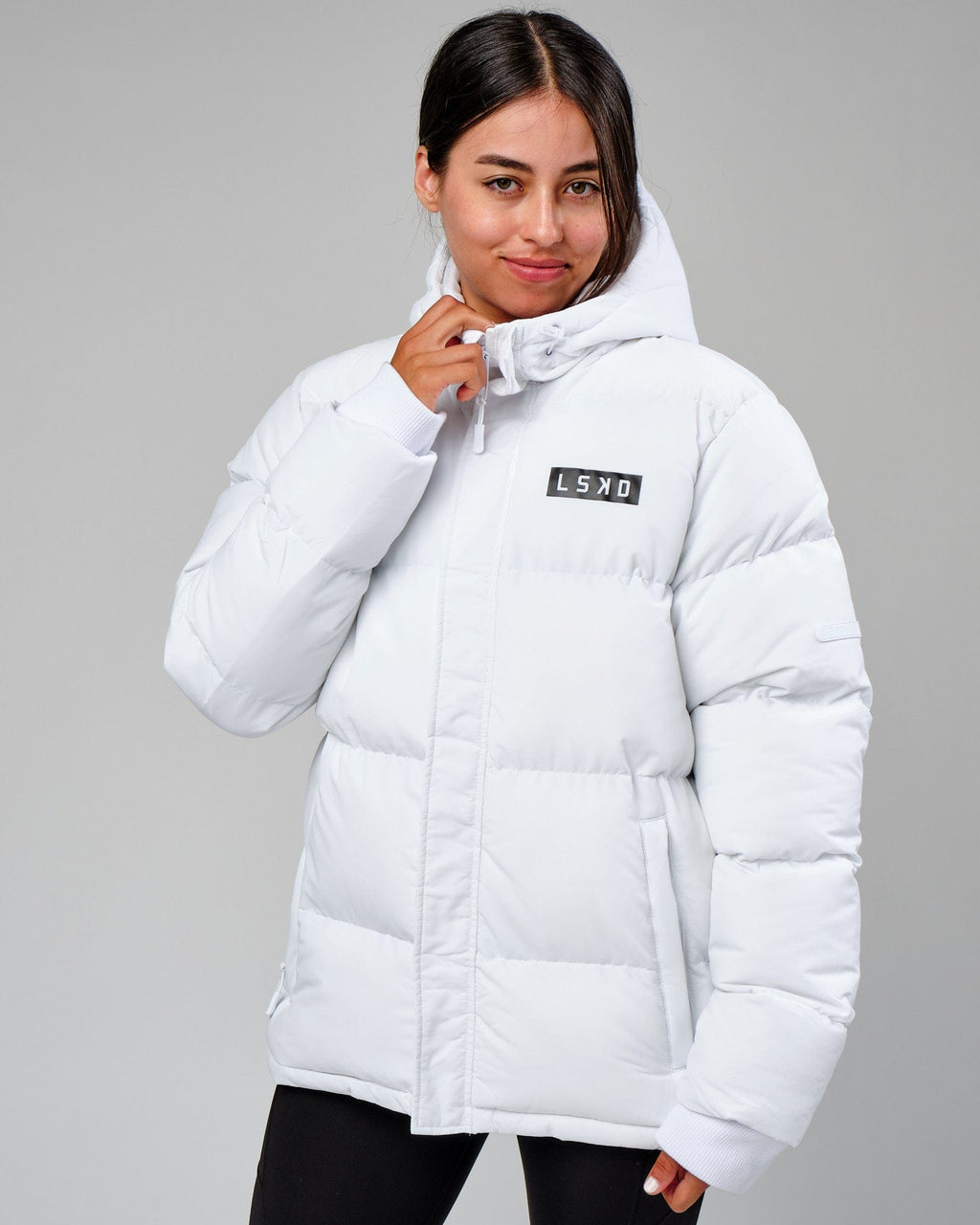 Model wearing Unisex Roasted Puffer Jacket Oversize 22 - White