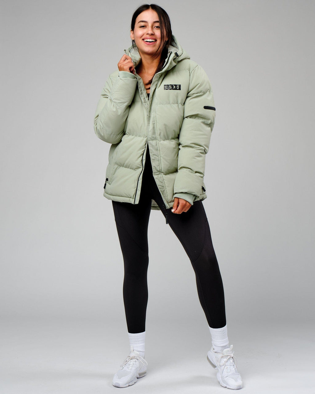 Model wearing Unisex Roasted Puffer Jacket Oversize 22 - Desert Sage