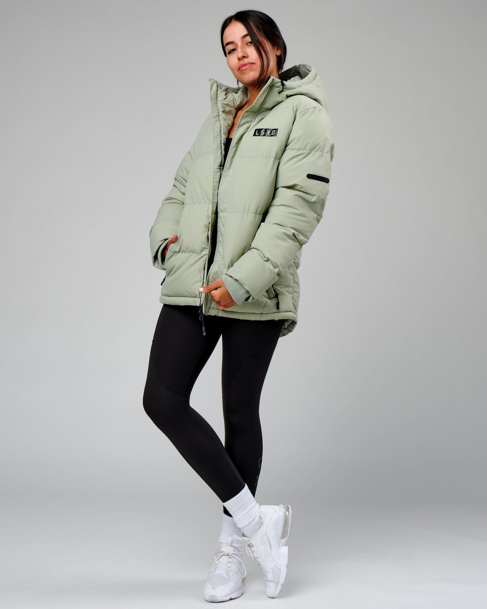 Model wearing Unisex Roasted Puffer Jacket Oversize 22 - Desert Sage