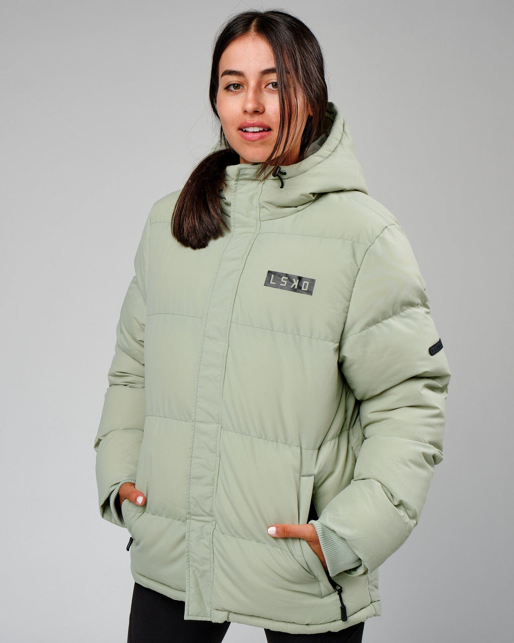 Model wearing Unisex Roasted Puffer Jacket Oversize 22 - Desert Sage