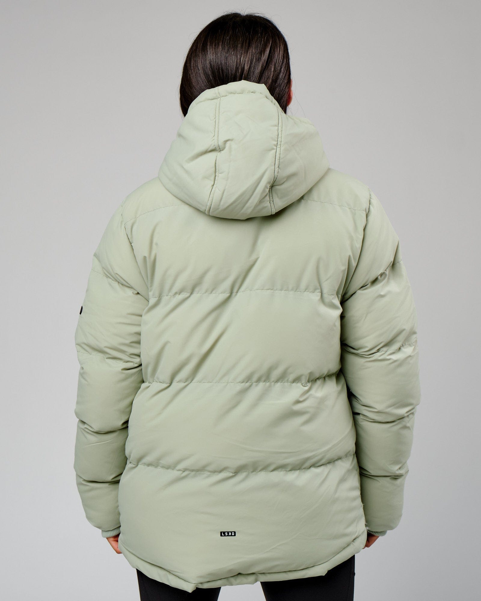 Model wearing Unisex Roasted Puffer Jacket Oversize 22 - Desert Sage