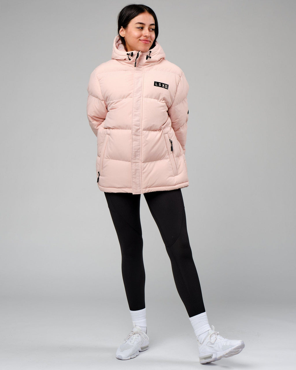 Model wearing Unisex Roasted Puffer Jacket Oversize 22 - Peach Whip