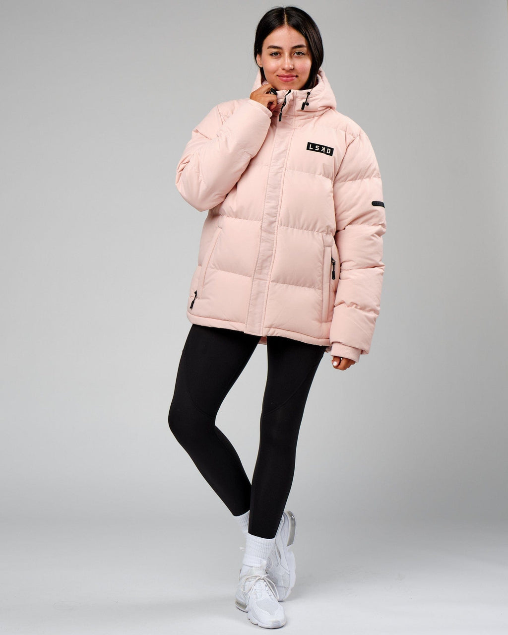 Model wearing Unisex Roasted Puffer Jacket Oversize 22 - Peach Whip