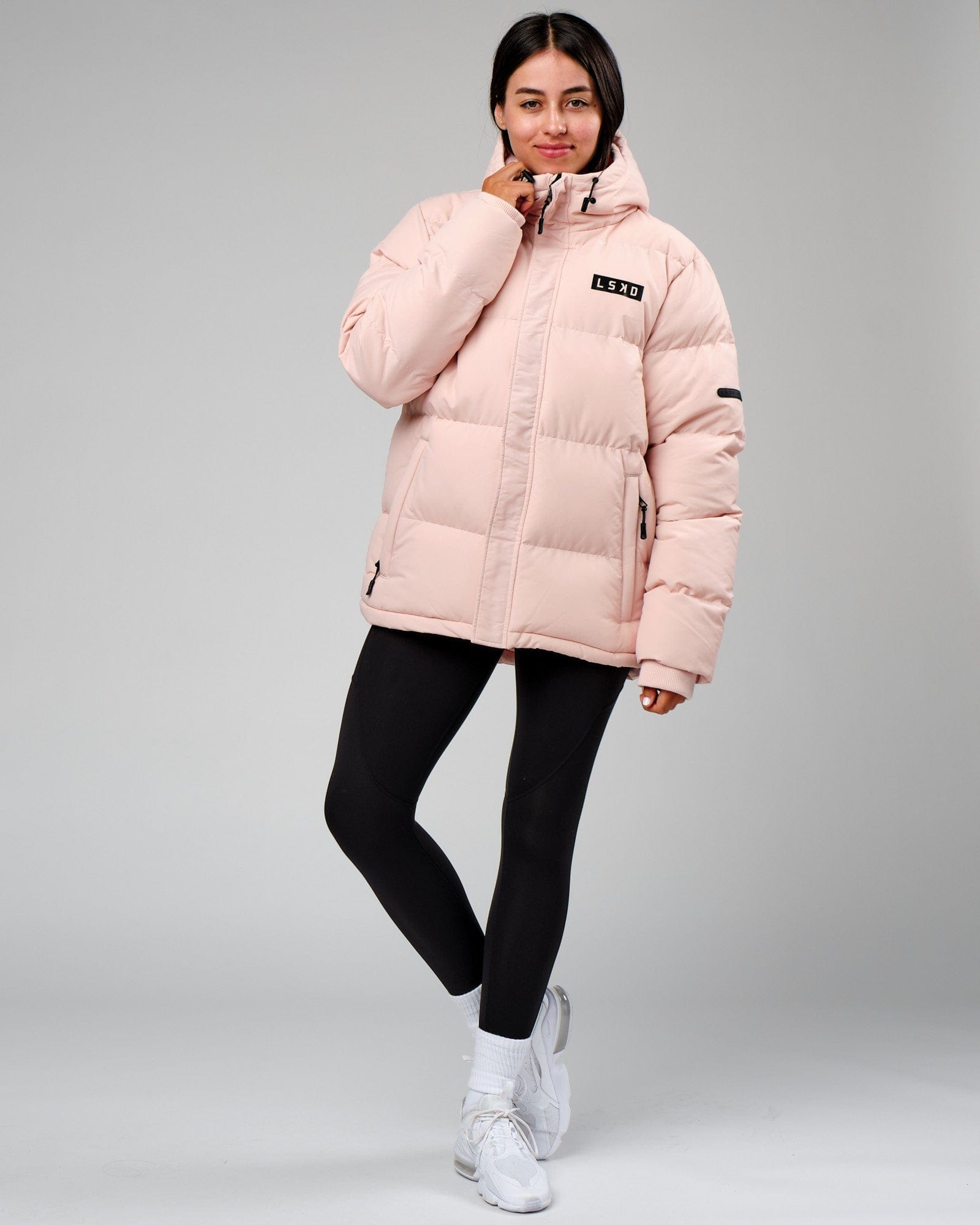 Model wearing Unisex Roasted Puffer Jacket Oversize 22 - Peach Whip