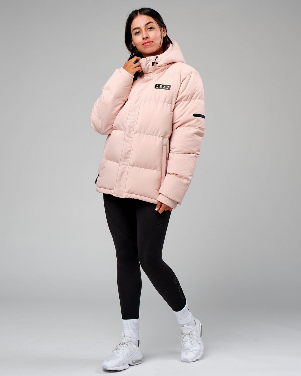 Model wearing Unisex Roasted Puffer Jacket Oversize 22 - Peach Whip