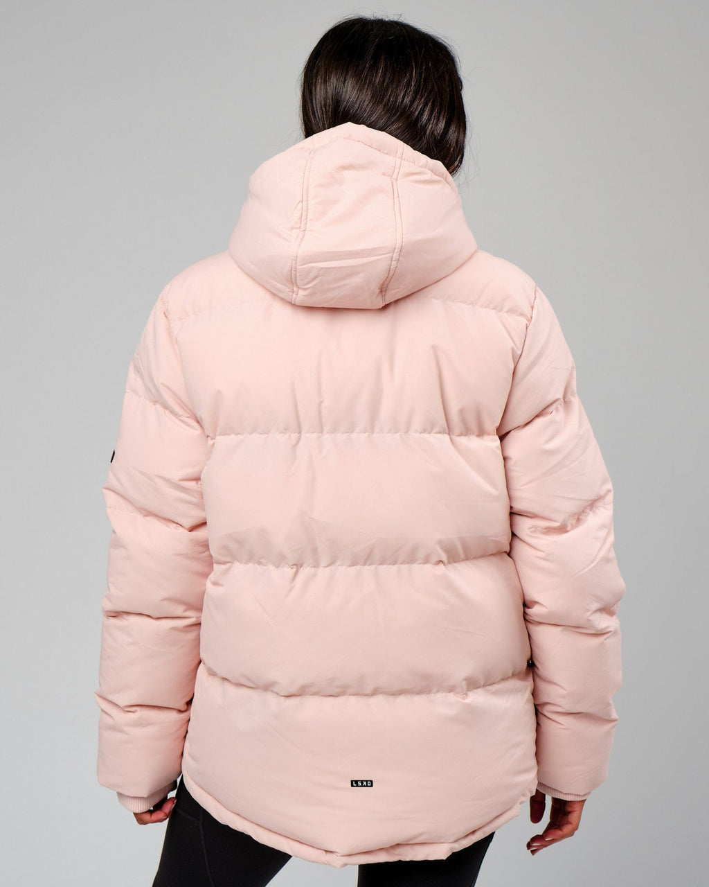 Model wearing Unisex Roasted Puffer Jacket Oversize 22 - Peach Whip