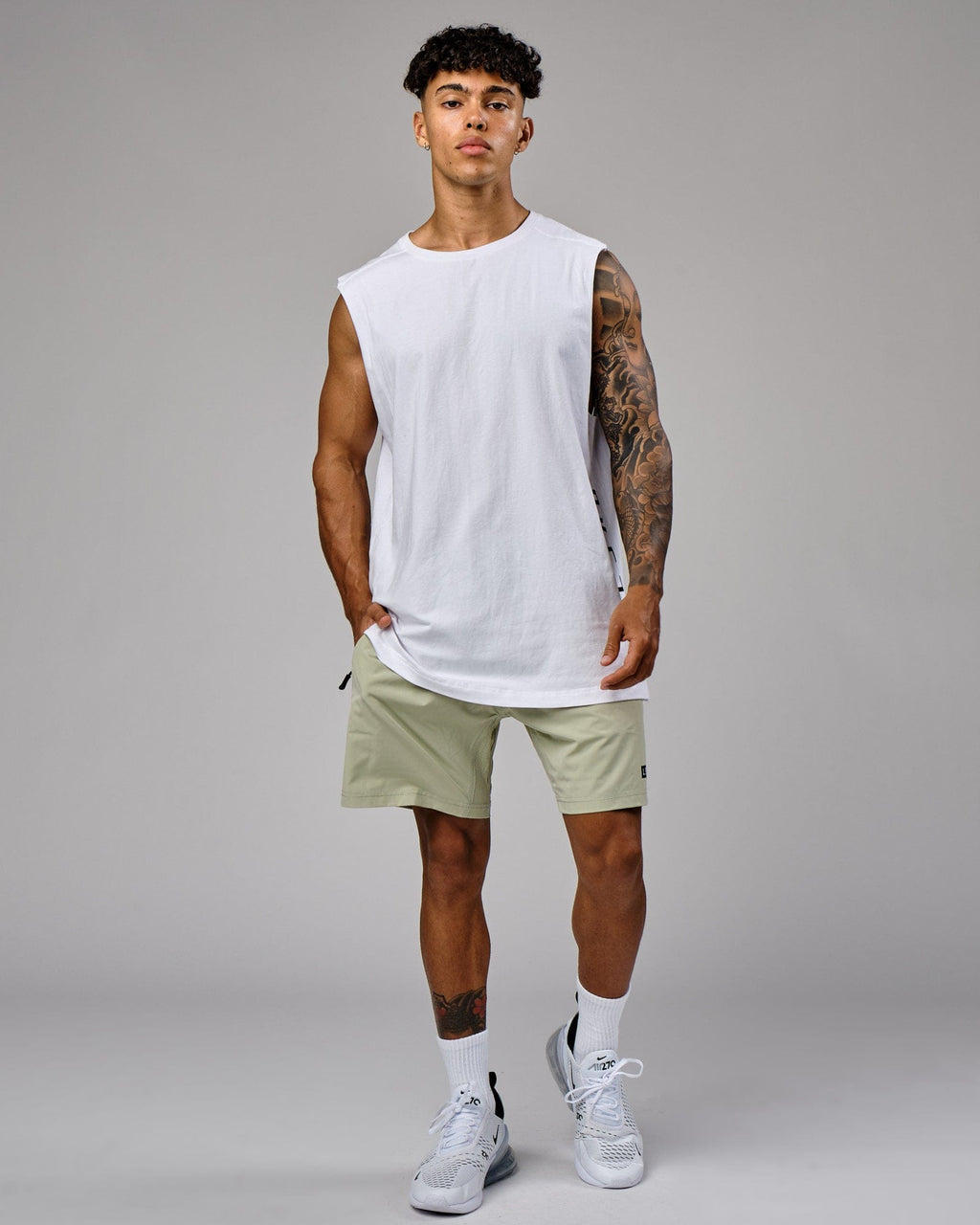Model wearing Rep 7" Performance Short - Desert Sage