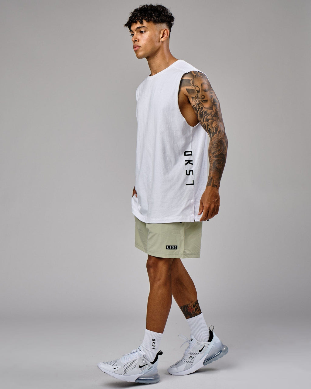 Model wearing Rep 7" Performance Short - Desert Sage