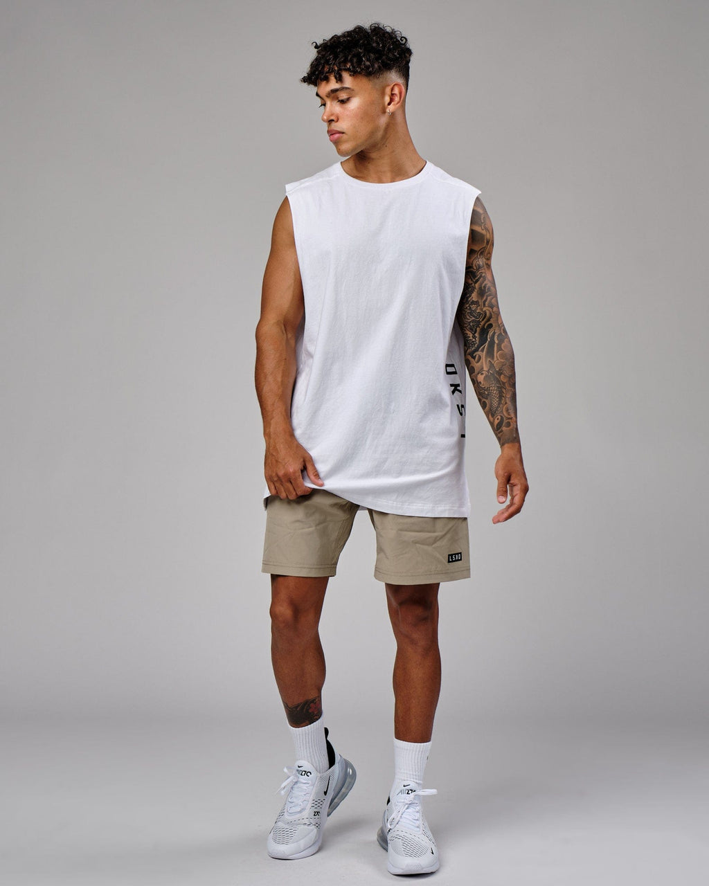 Model wearing Rep 7" Performance Short - Laurel Oak