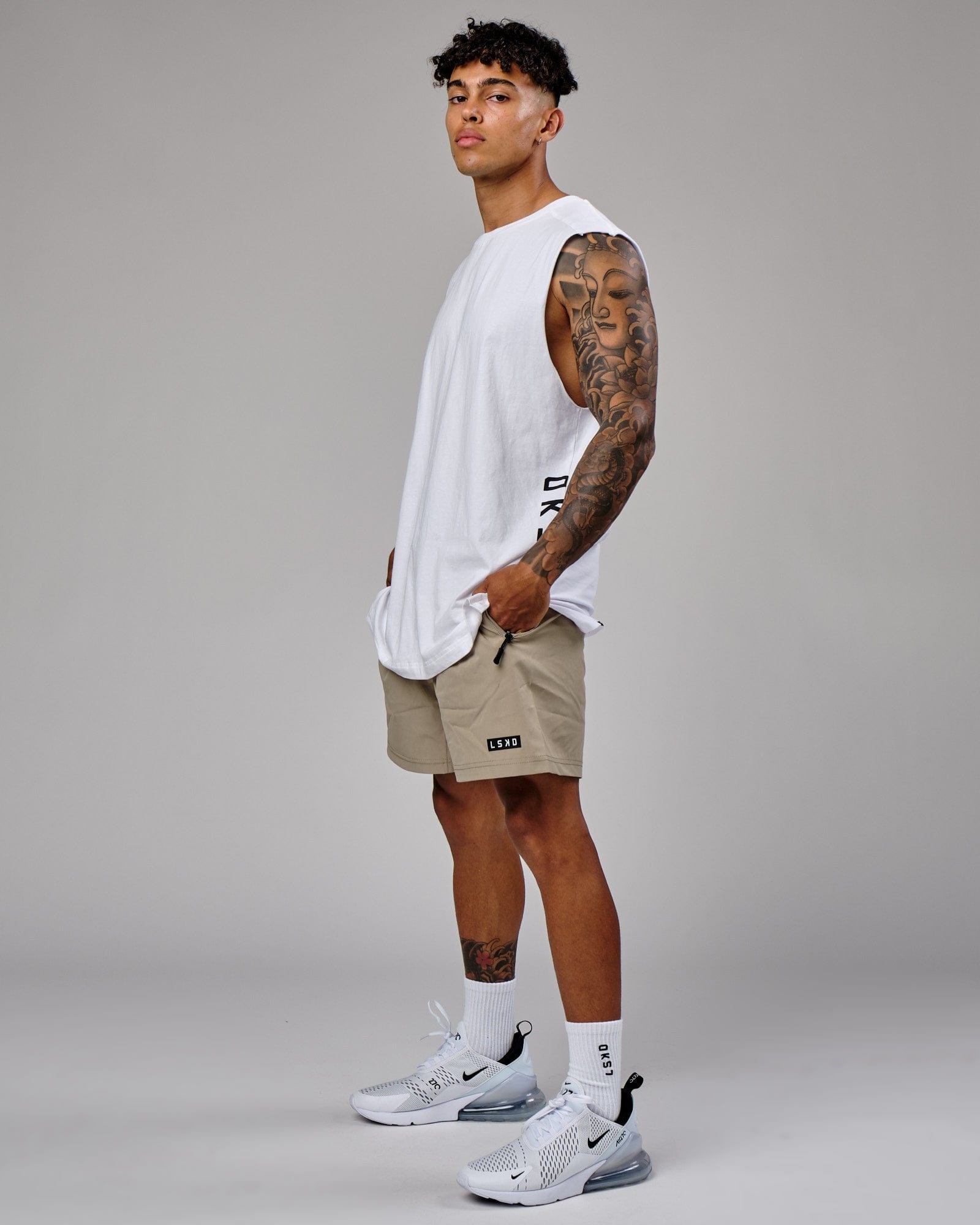 Model wearing Rep 7" Performance Short - Laurel Oak