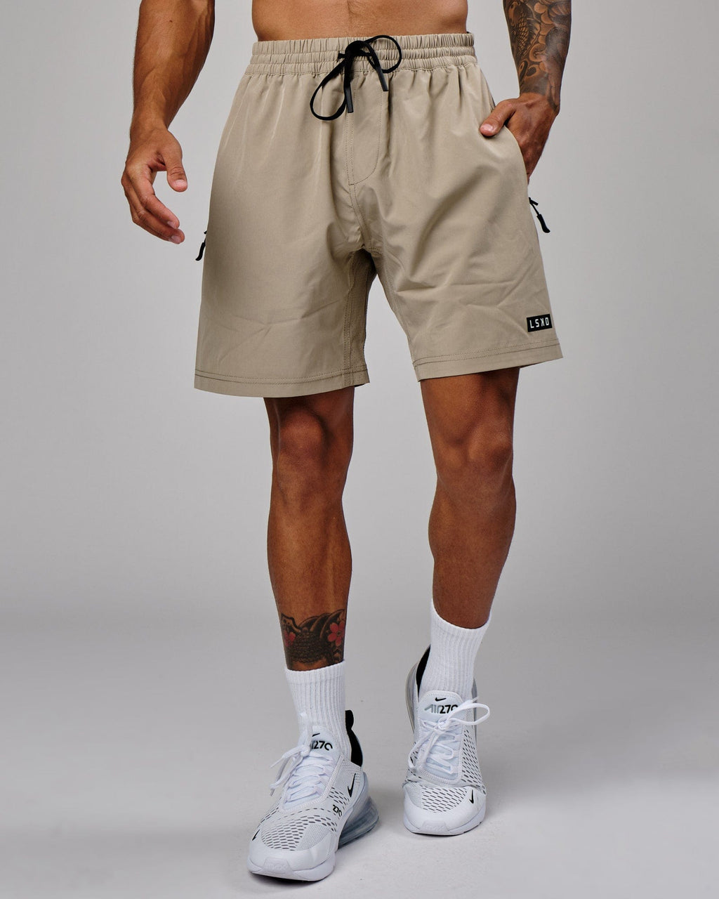 Model wearing Rep 7" Performance Short - Laurel Oak