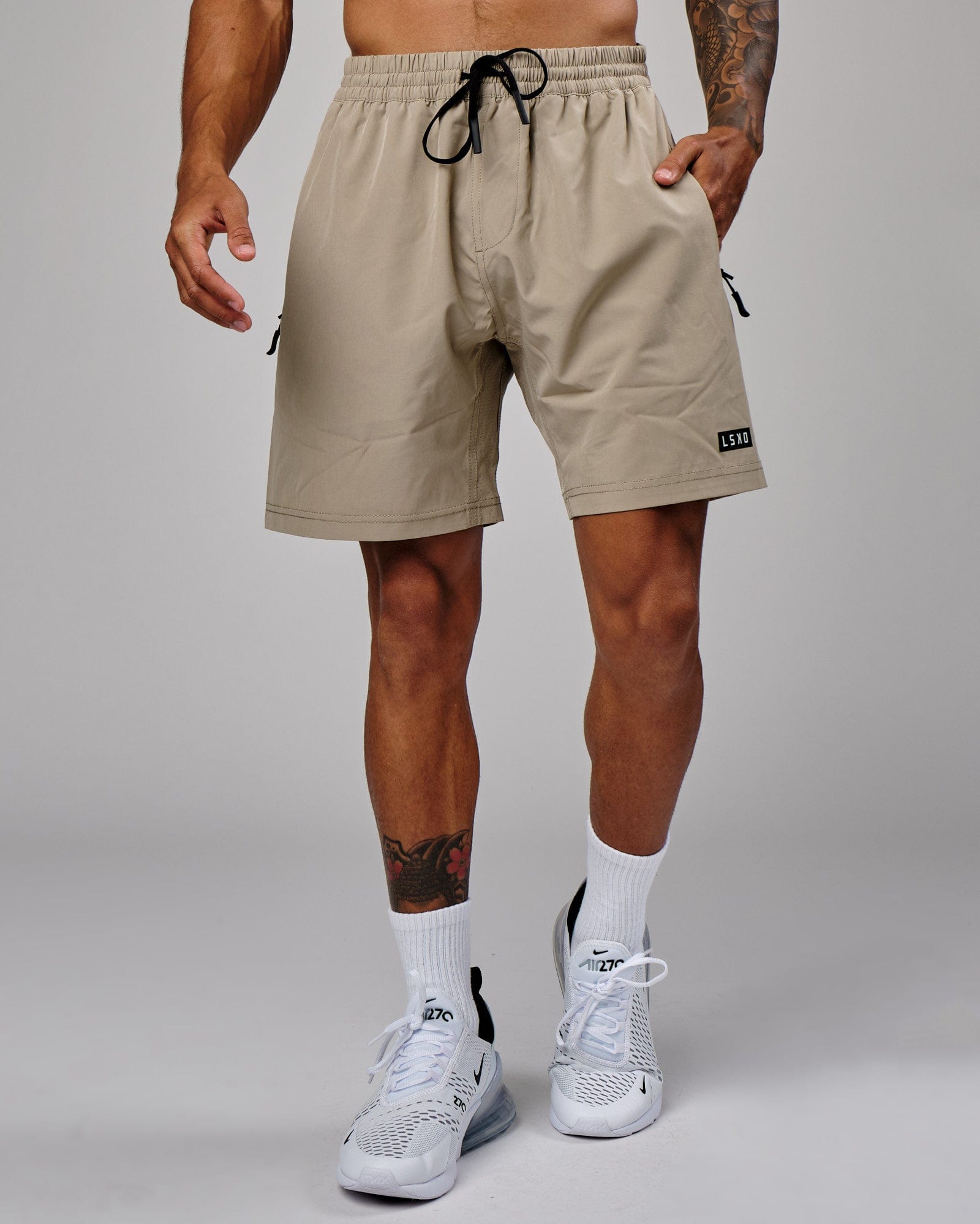 Model wearing Rep 7" Performance Short - Laurel Oak