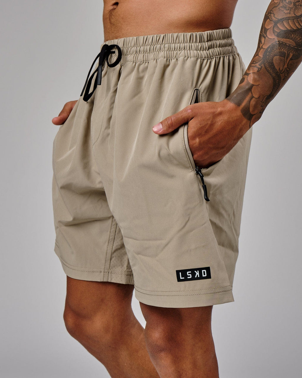 Model wearing Rep 7" Performance Short - Laurel Oak