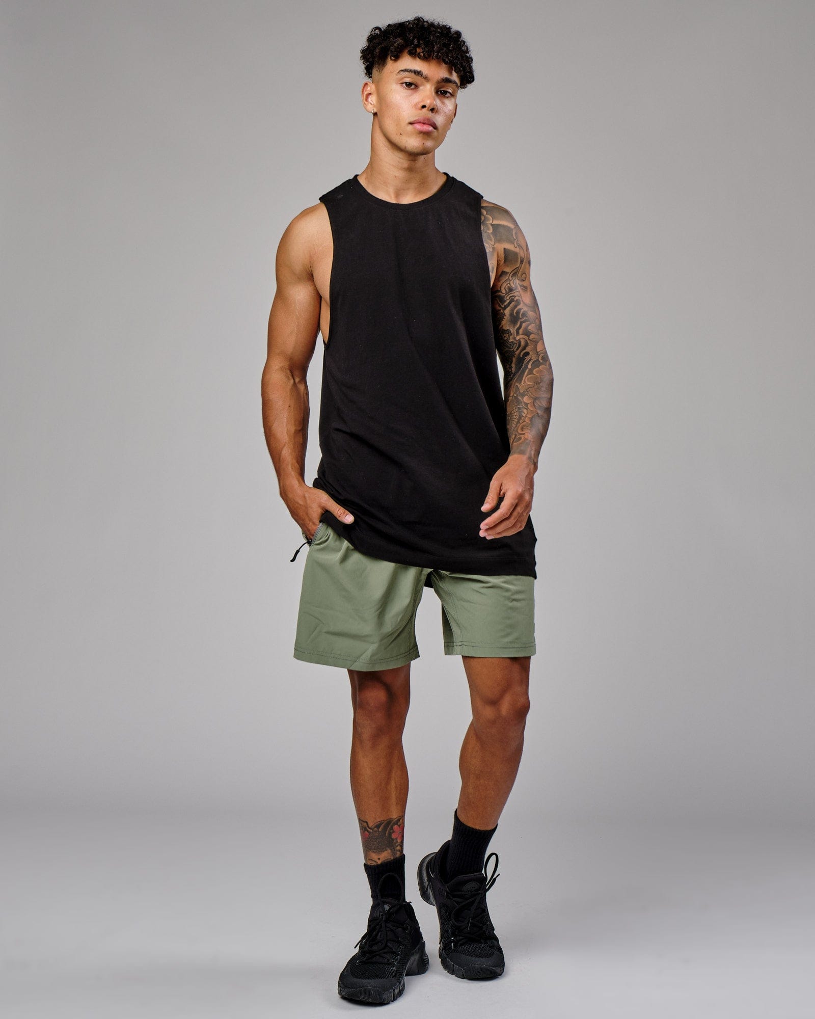 Model wearing Rep 7" Performance Short - Sea Spray