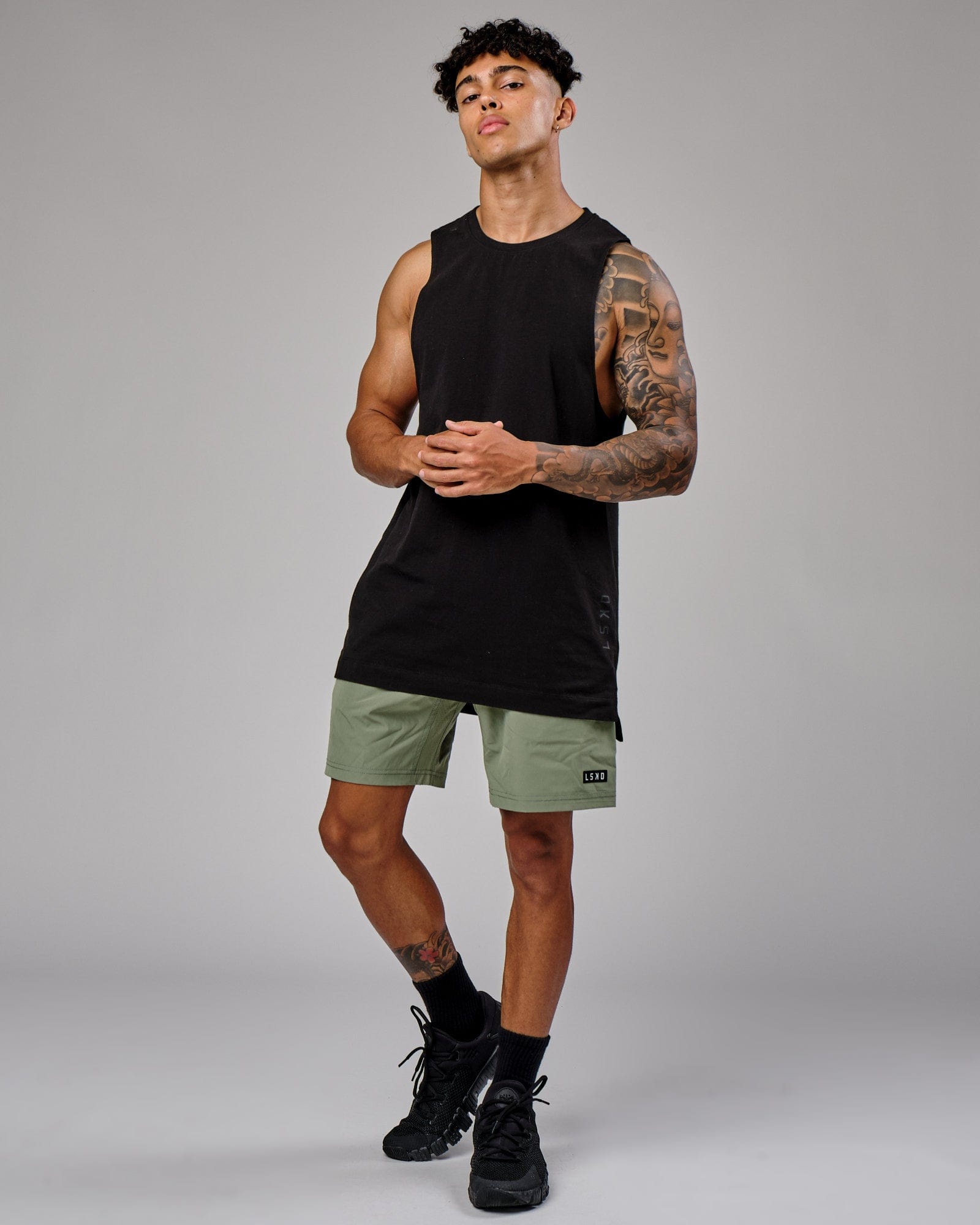 Model wearing Rep 7" Performance Short - Sea Spray