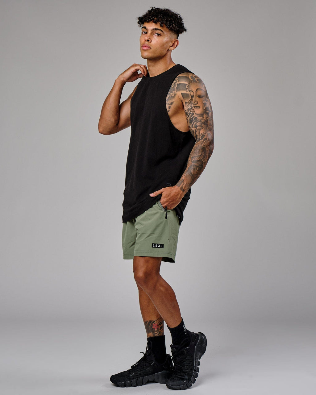 Model wearing Rep 7" Performance Short - Sea Spray
