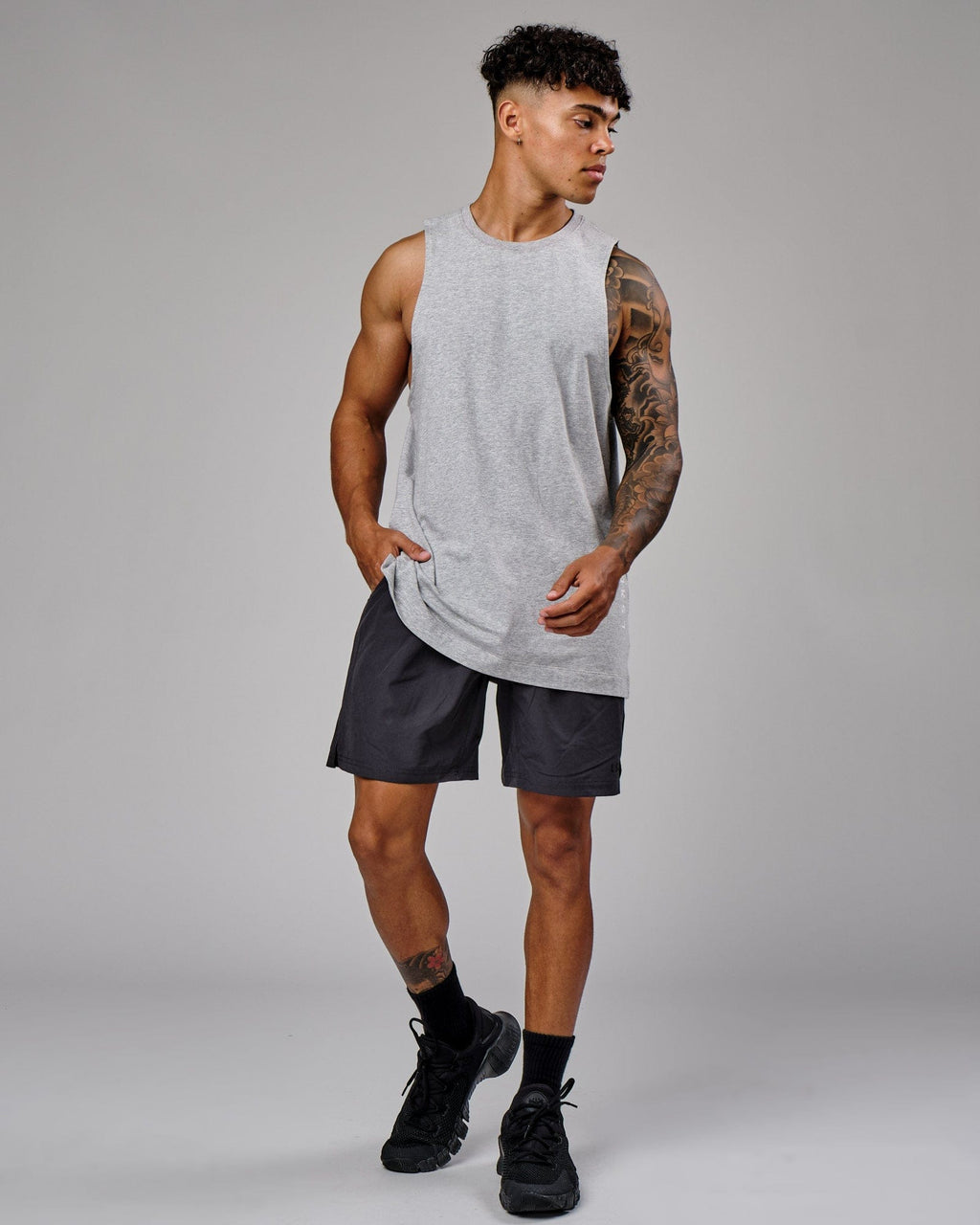 Model wearing Intensity 7" Performance Short - Phantom