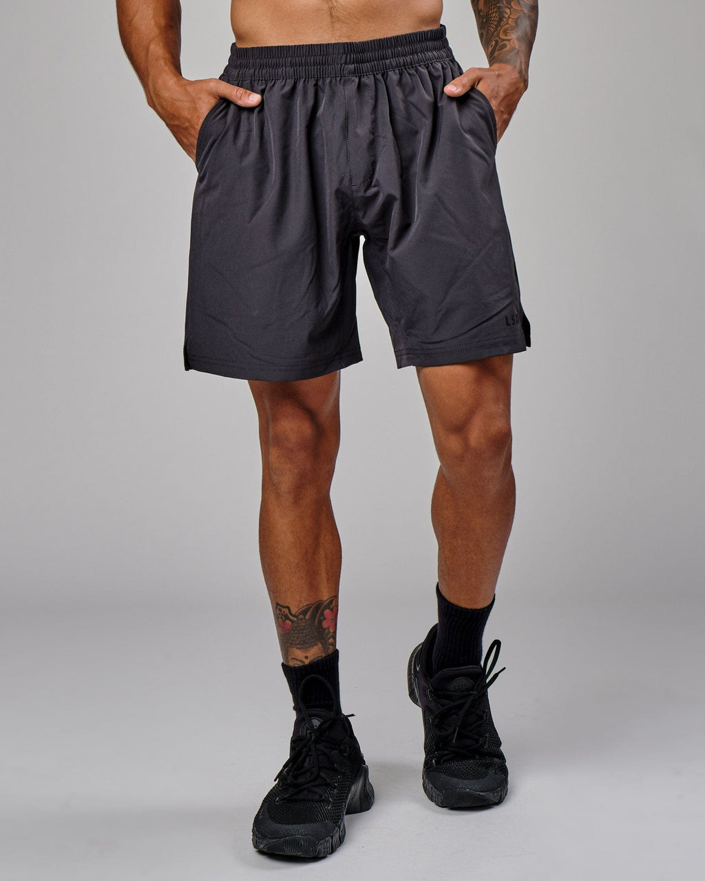 Model wearing Intensity 7" Performance Short - Phantom