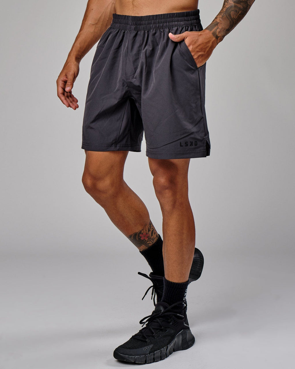 Model wearing Intensity 7" Performance Short - Phantom