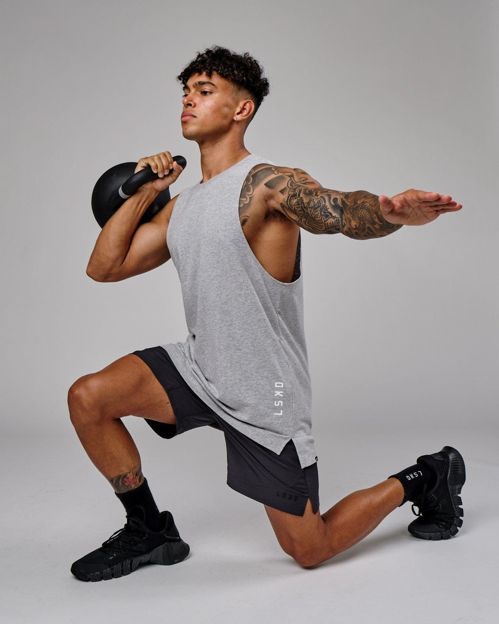 Model wearing Intensity 7" Performance Short - Phantom