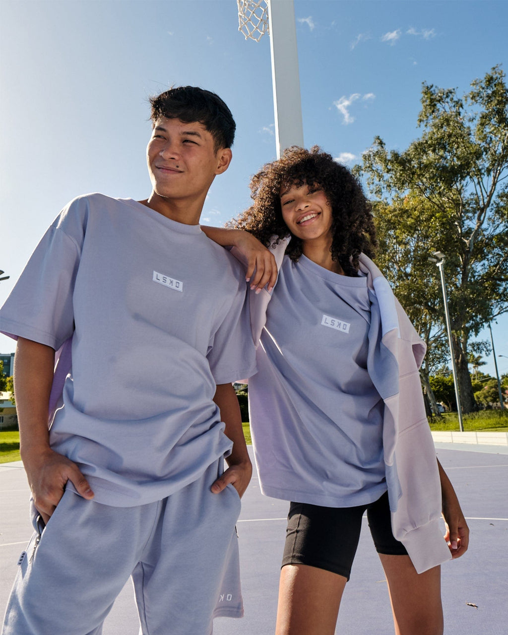 Model wearing Unisex Cornerstone Tee Oversize - Cosmic Sky
