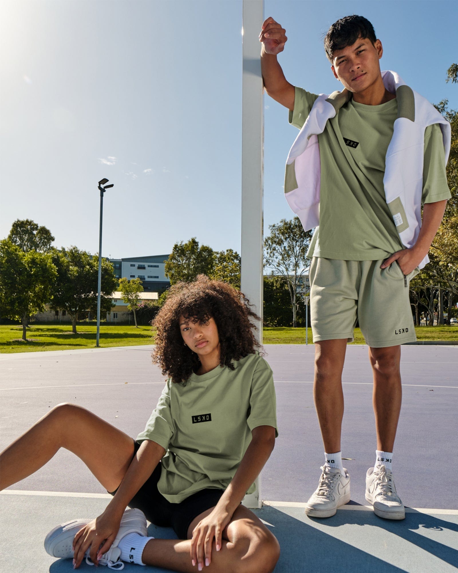 Model wearing Unisex Cornerstone Tee Oversize - Desert Sage