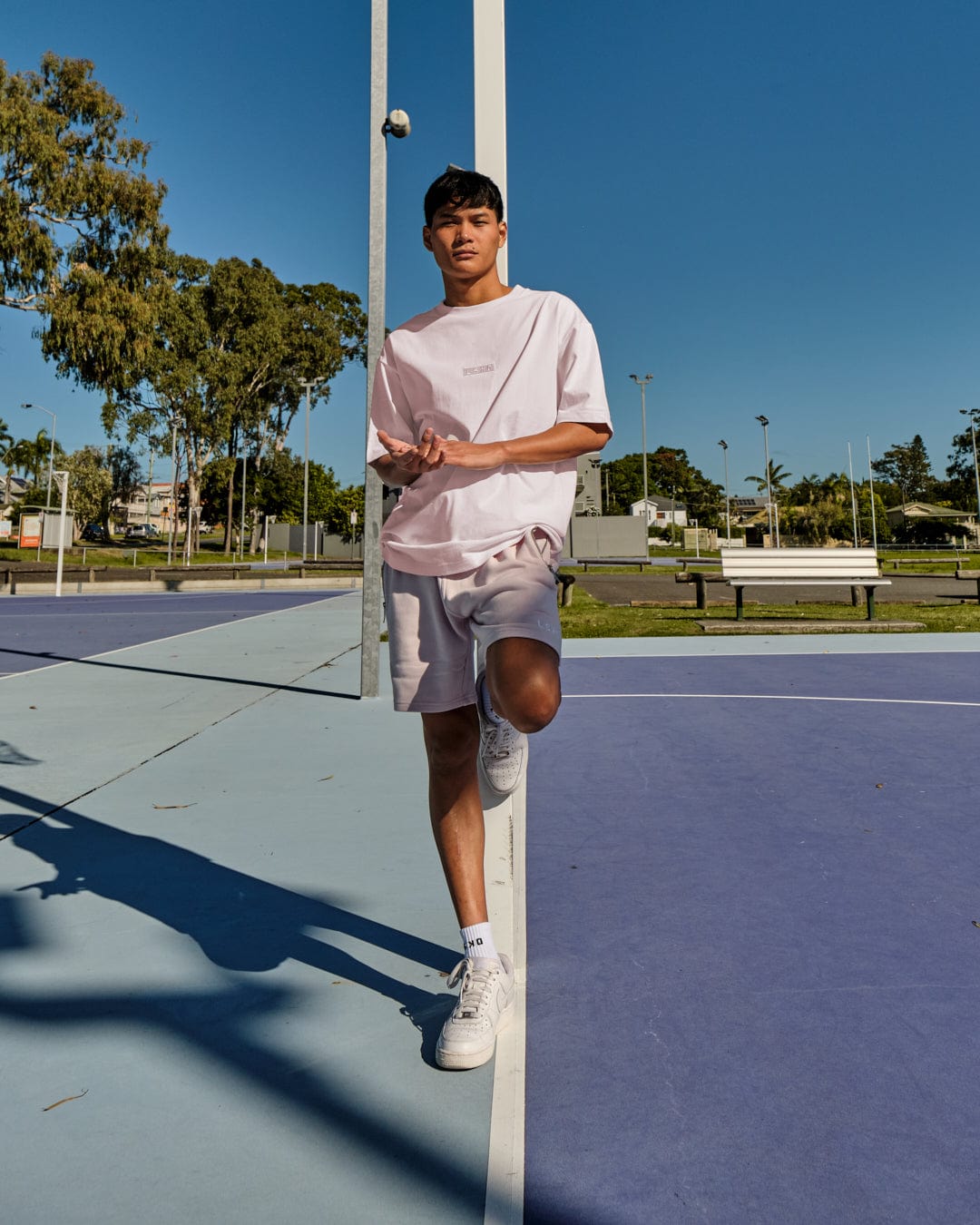 Model wearing Cornerstone Tee Oversize - Orchid Ice