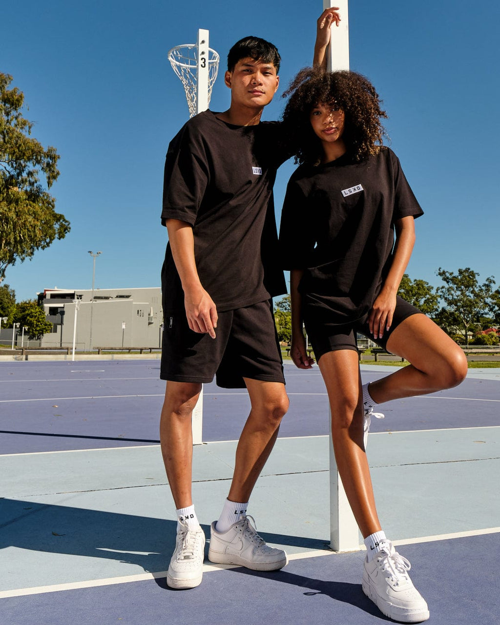 Model wearing Unisex Cornerstone Tee Oversize - Black