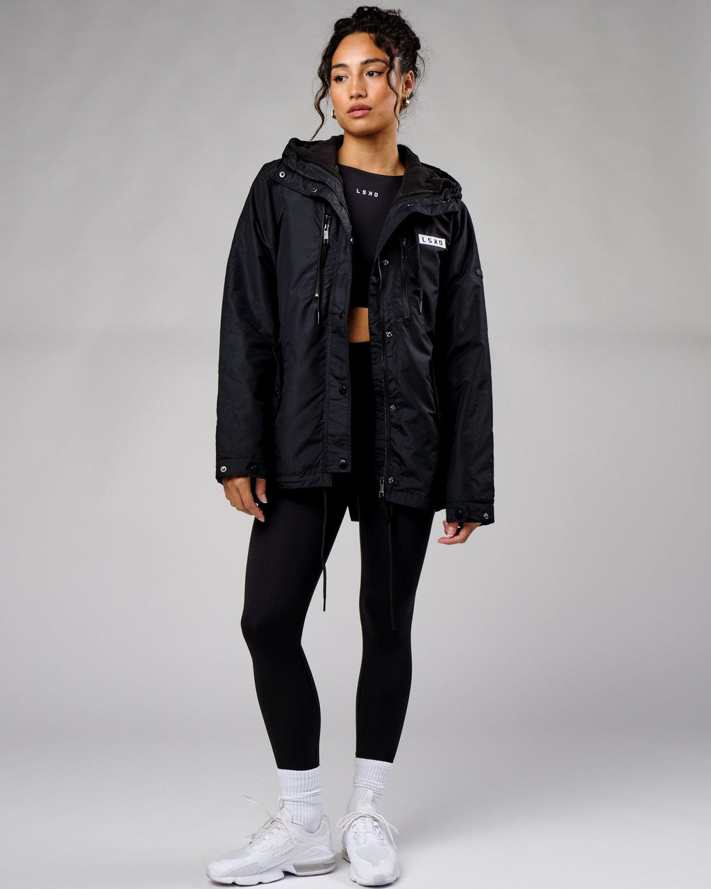 Model wearing Unisex Tack Anorak Jacket - Black