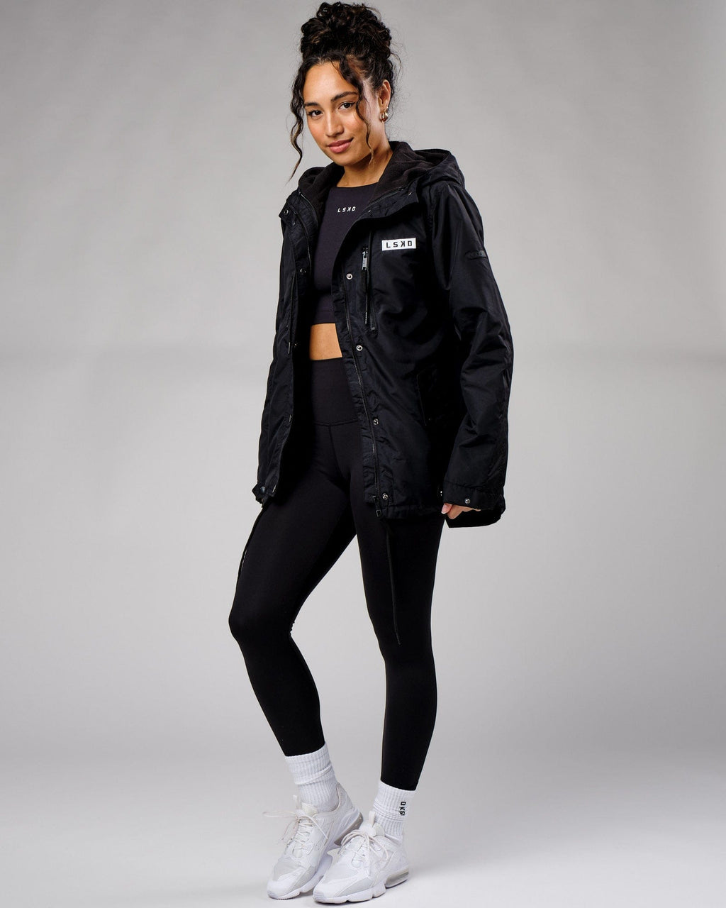 Model wearing Unisex Tack Anorak Jacket - Black