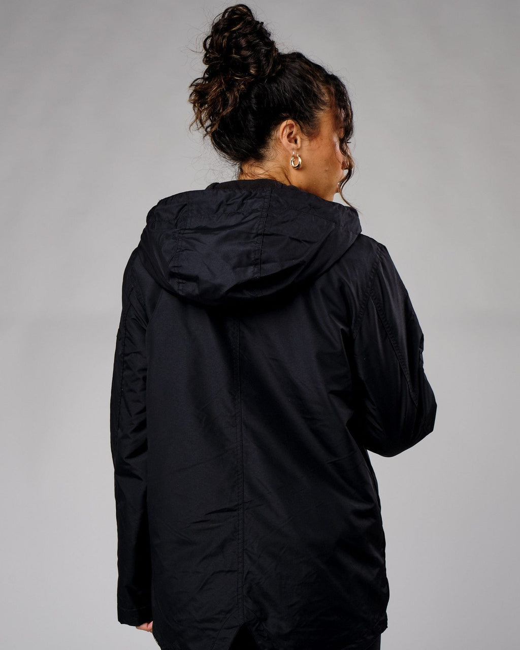 Model wearing Unisex Tack Anorak Jacket - Black