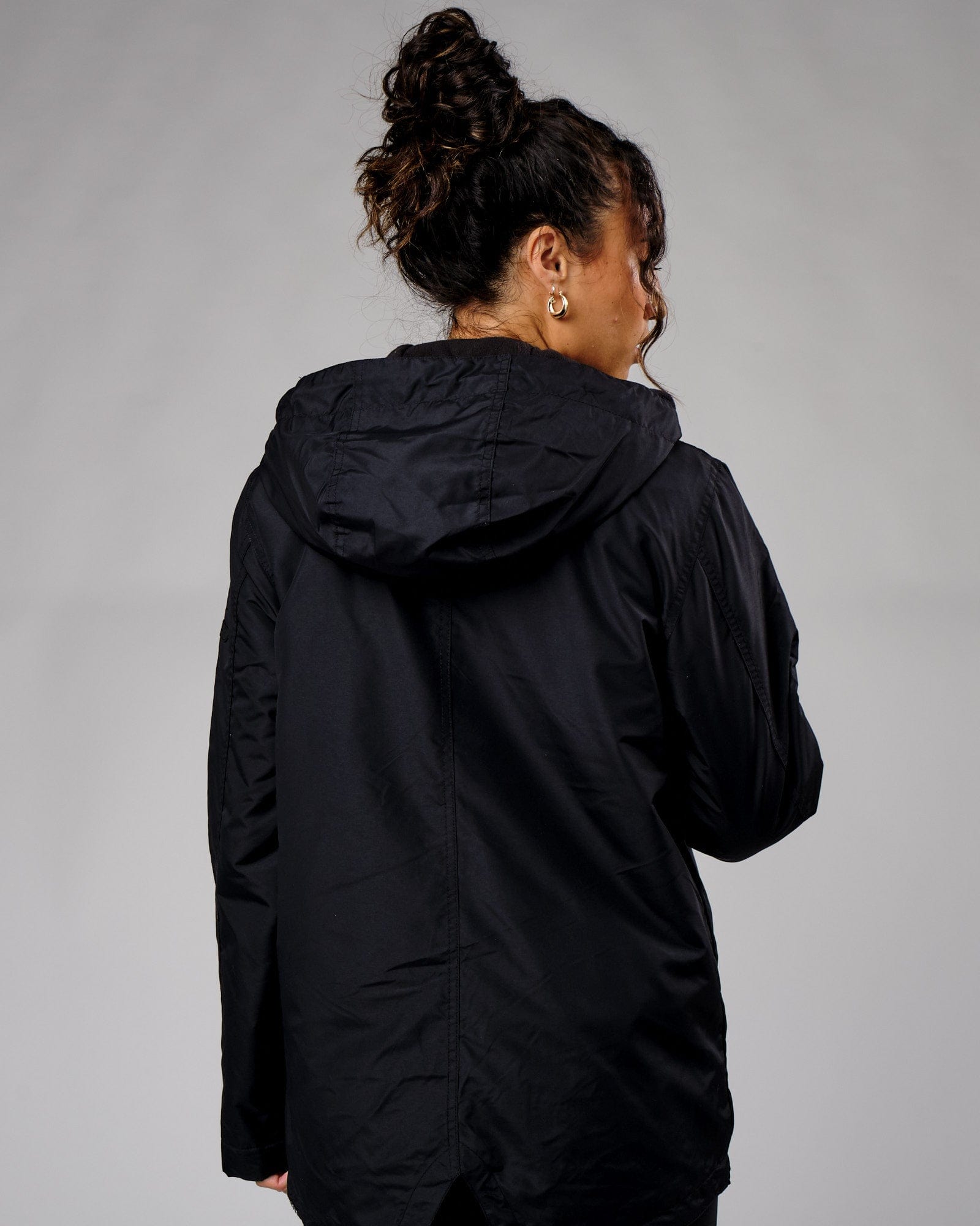 Model wearing Unisex Tack Anorak Jacket - Black