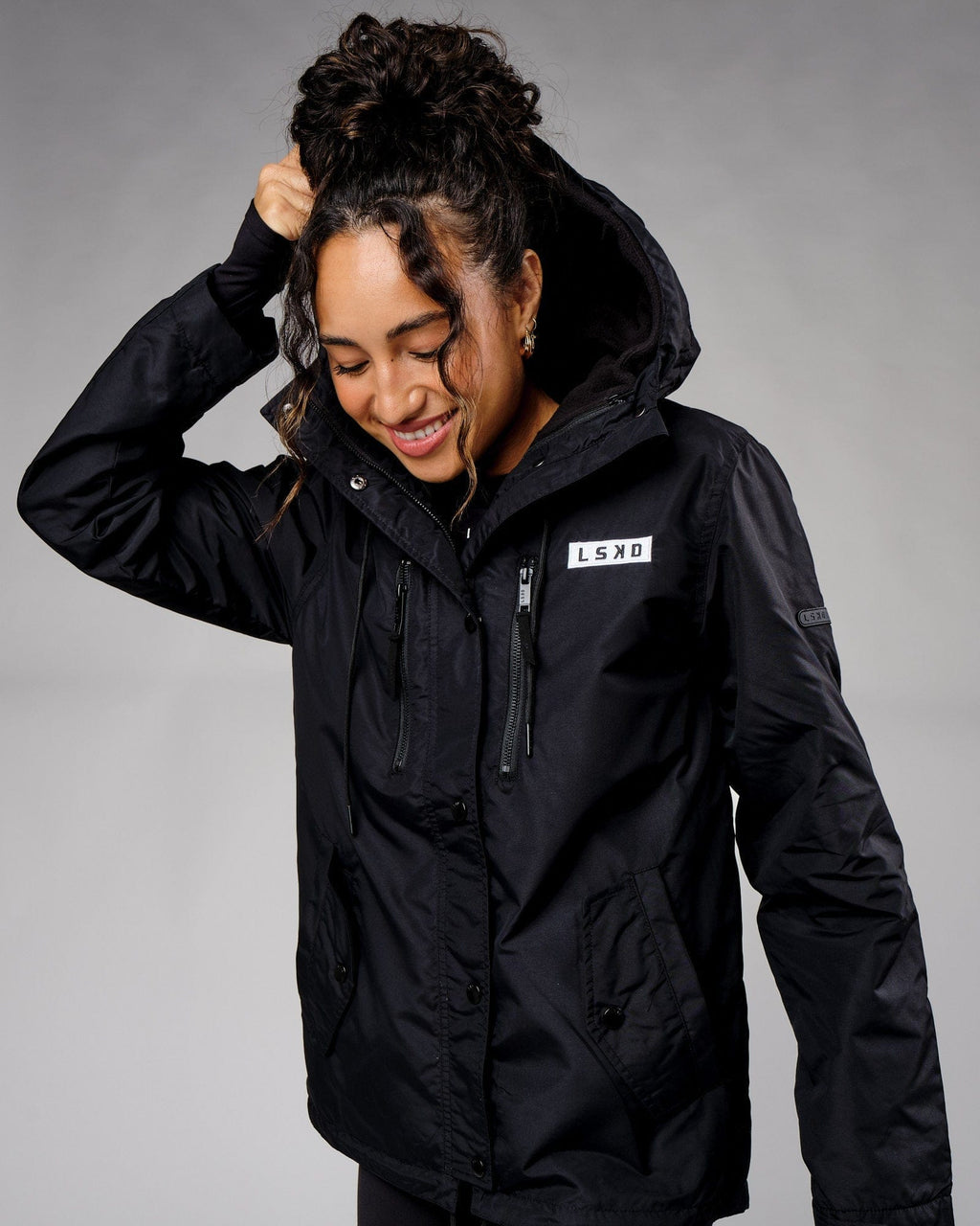 Model wearing Unisex Tack Anorak Jacket - Black