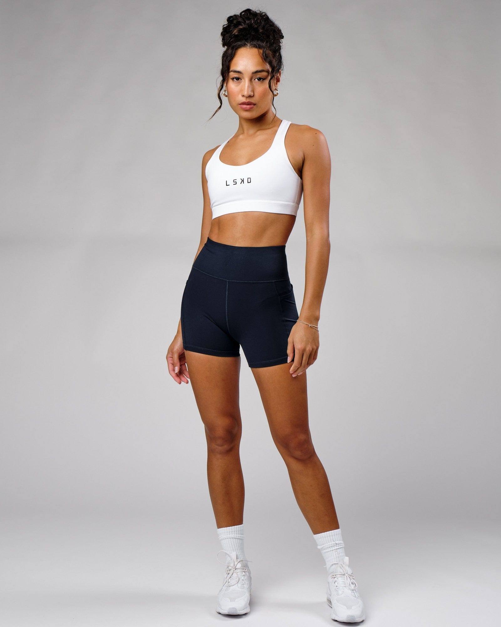 Model wearing Rep X-Short Tight - Navy