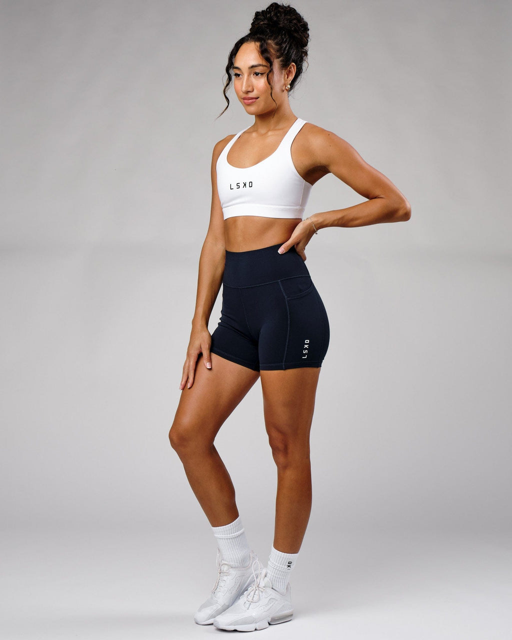 Model wearing Rep X-Short Tight - Navy