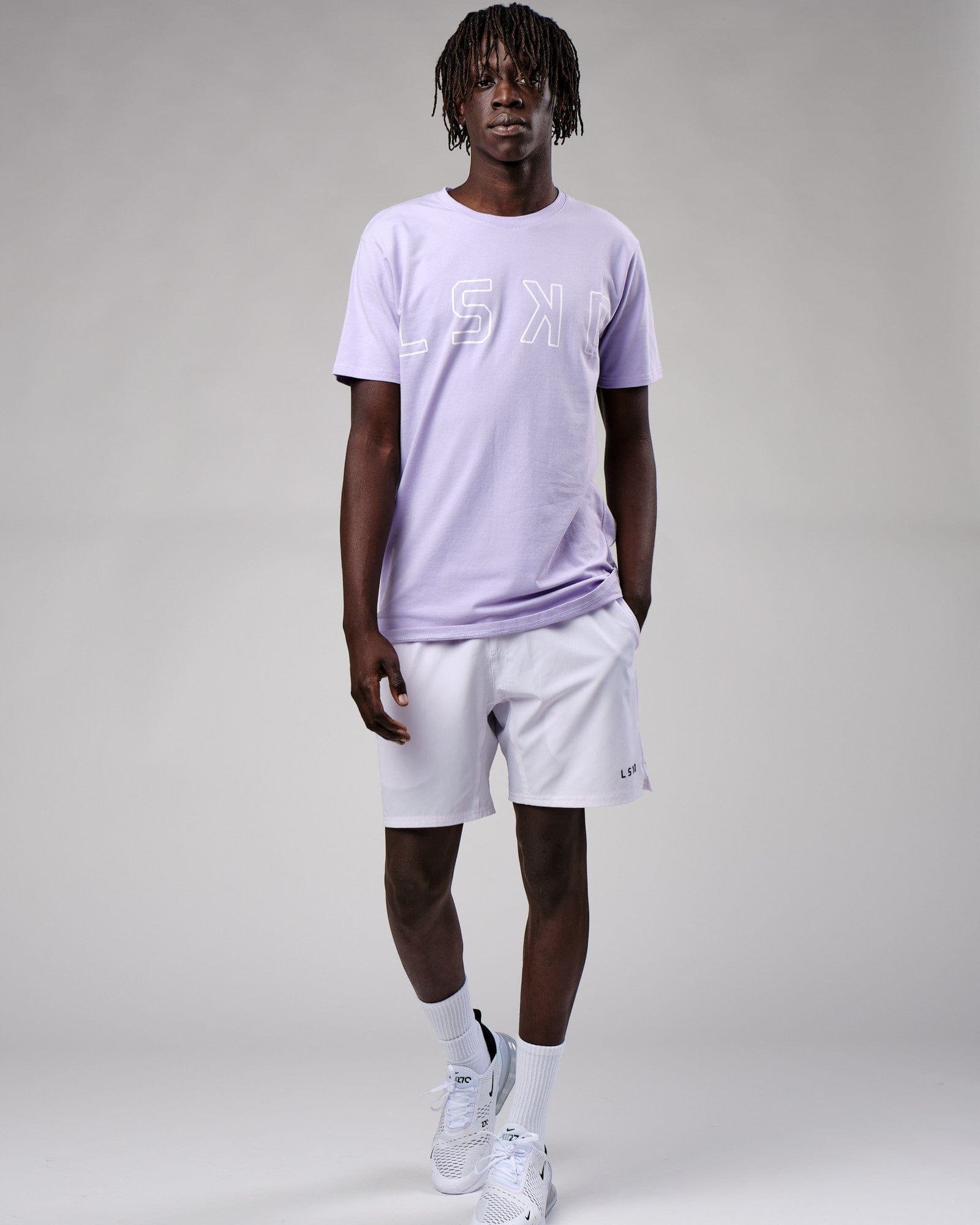 Model wearing Expand FLXCotton Tee - Cosmic Sky