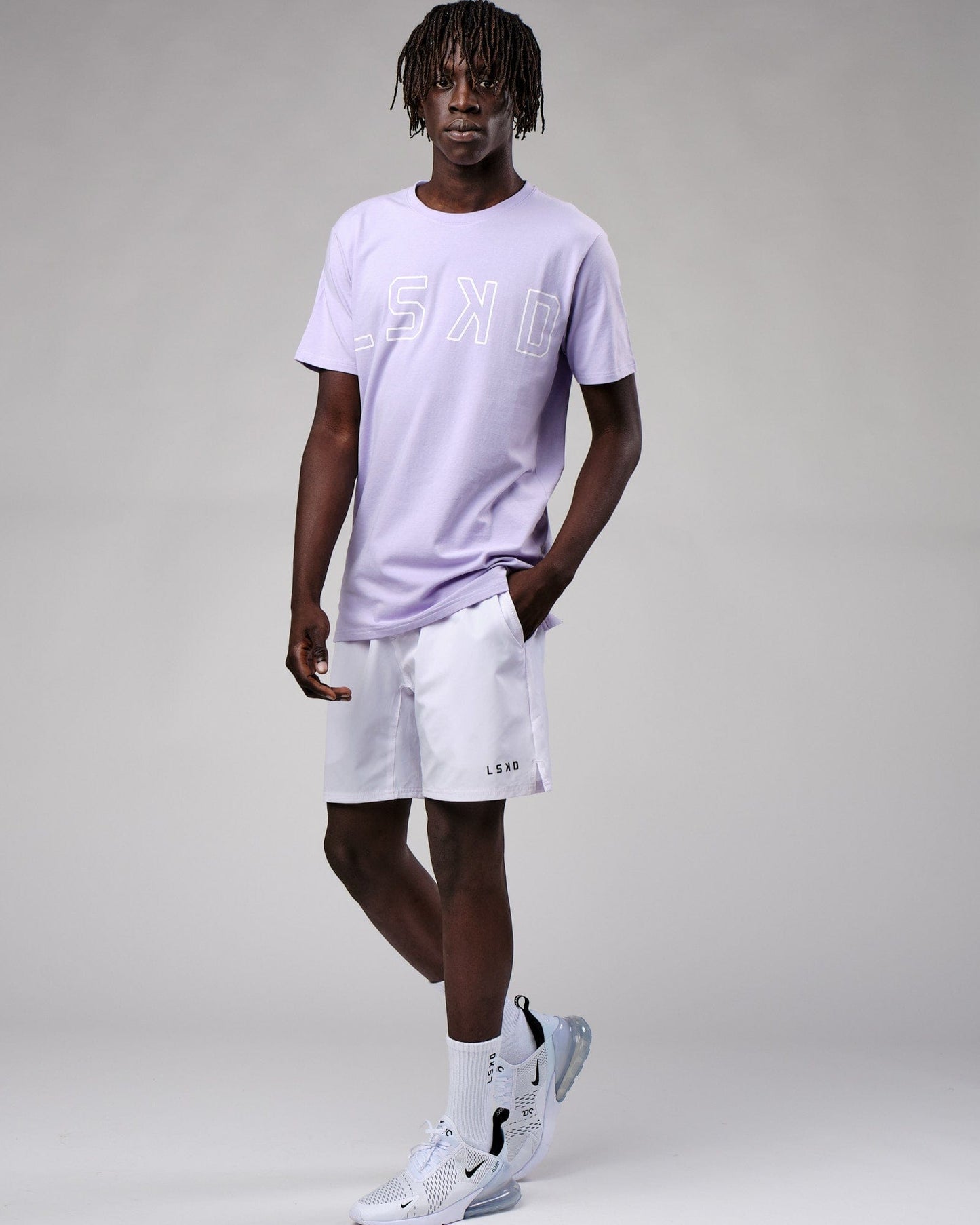 Model wearing Expand FLXCotton Tee - Cosmic Sky