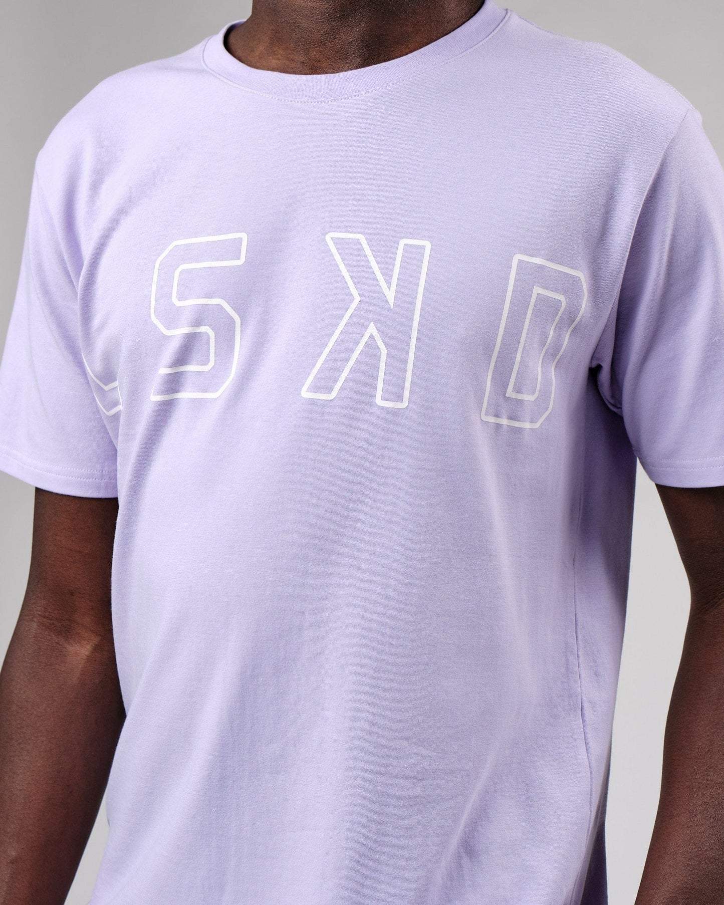 Model wearing Expand FLXCotton Tee - Cosmic Sky