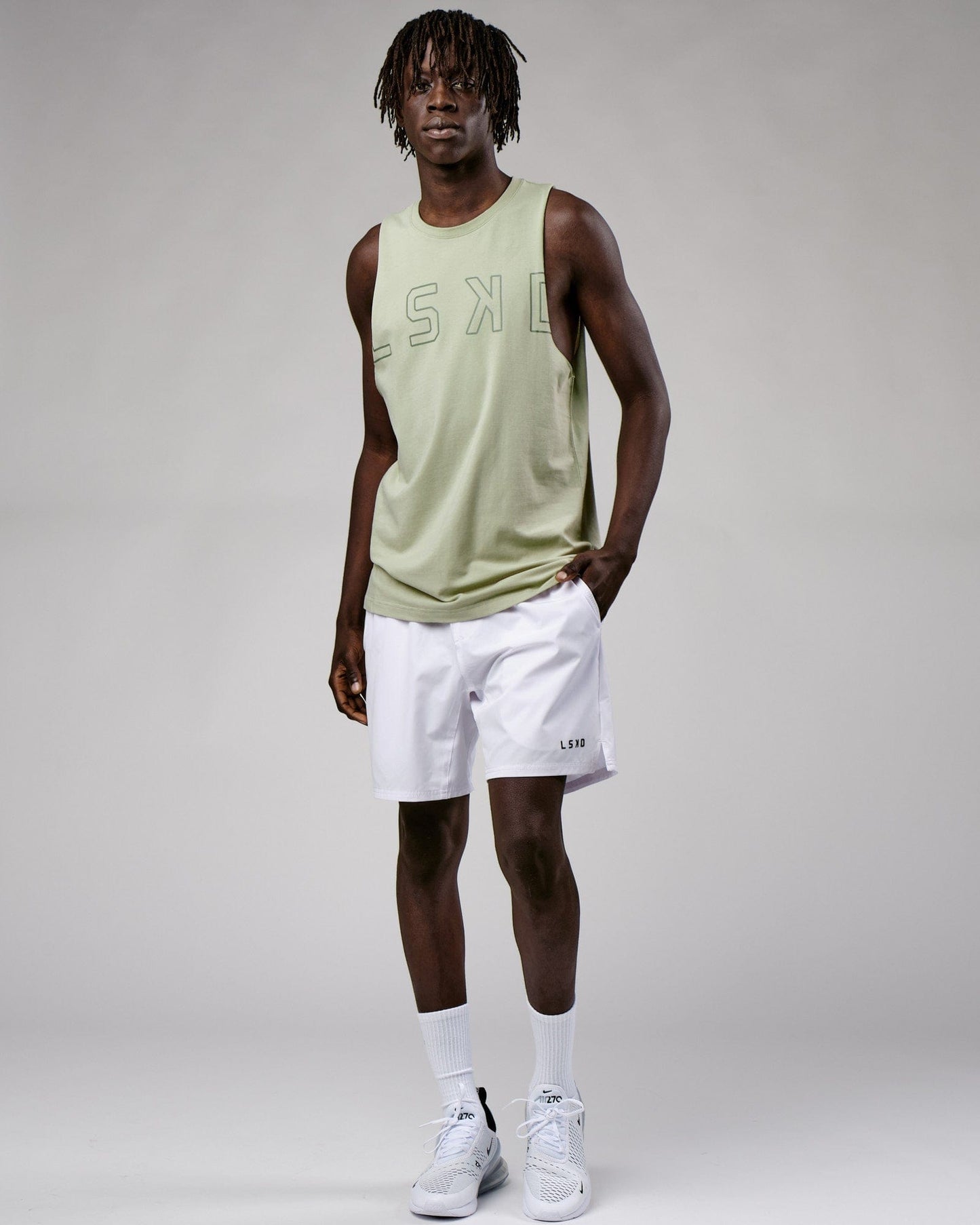 Model wearing Expand FLXCotton Training Fit Tank - Desert Sage