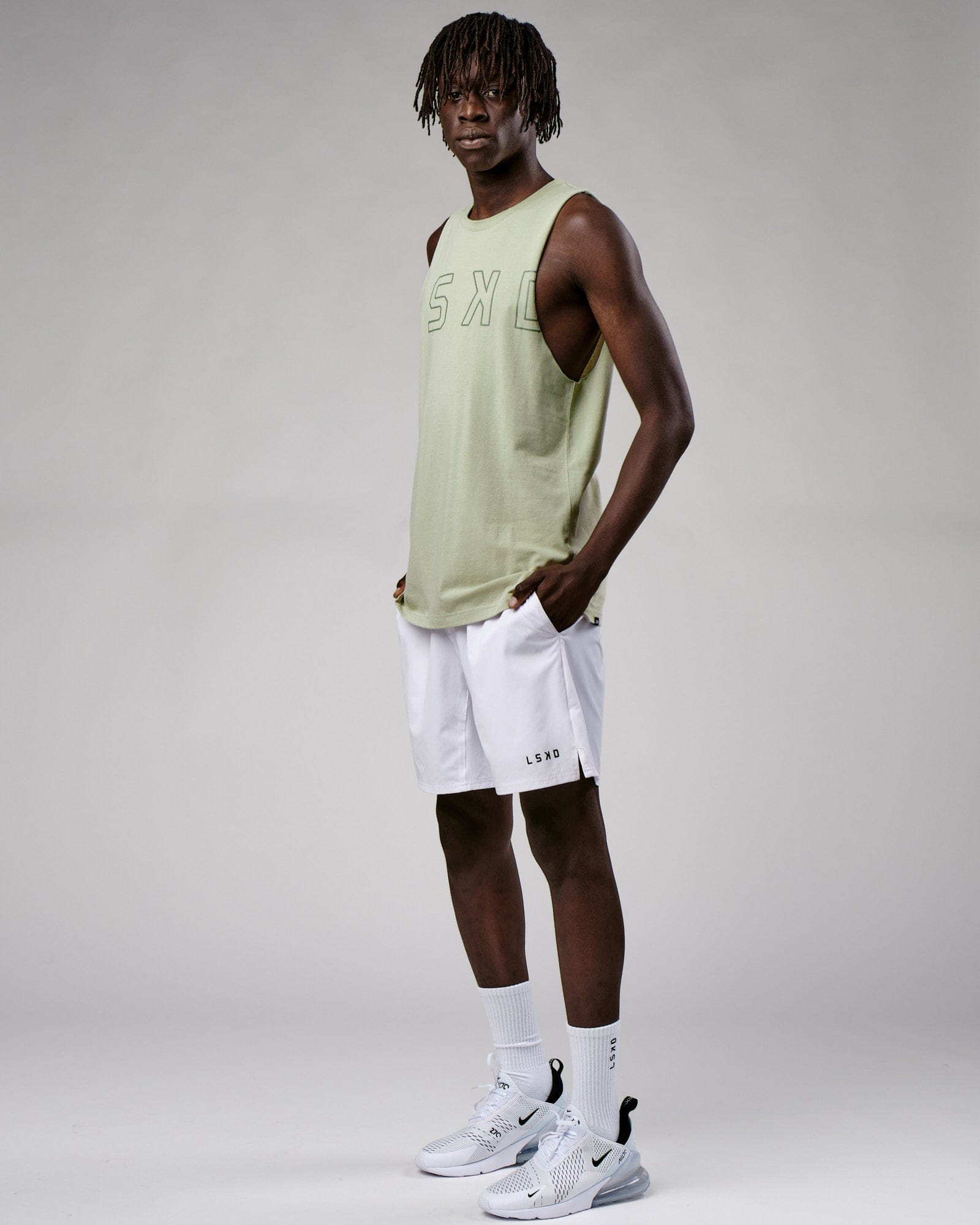Model wearing Expand FLXCotton Training Fit Tank - Desert Sage