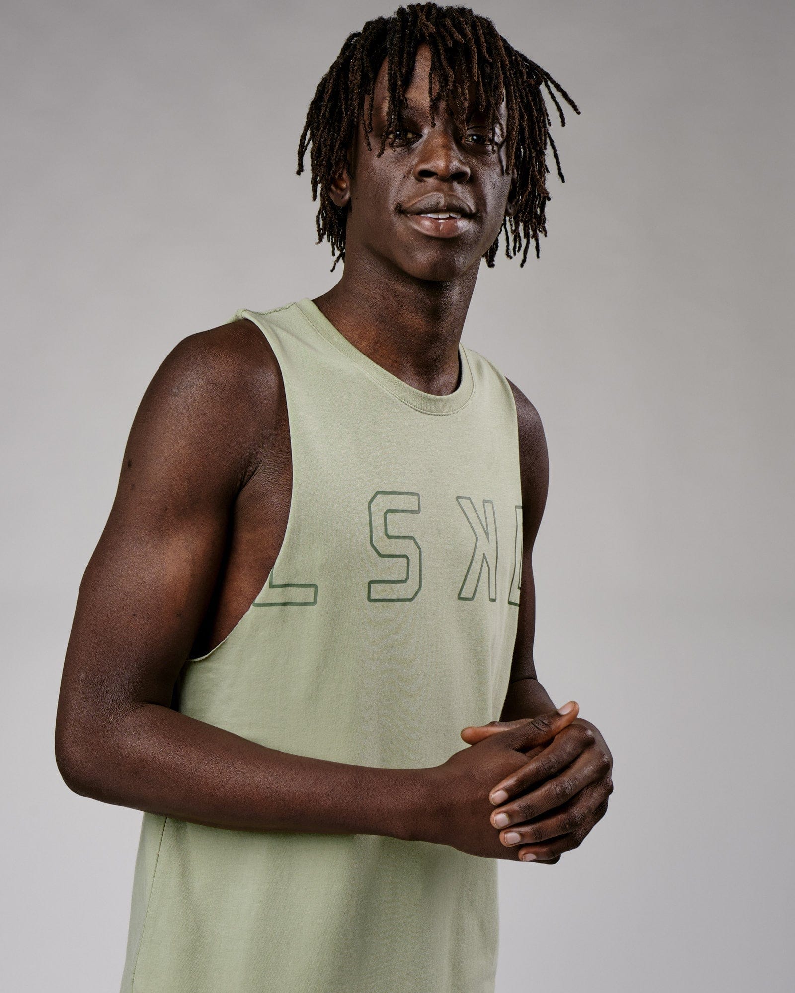 Model wearing Expand FLXCotton Training Fit Tank - Desert Sage