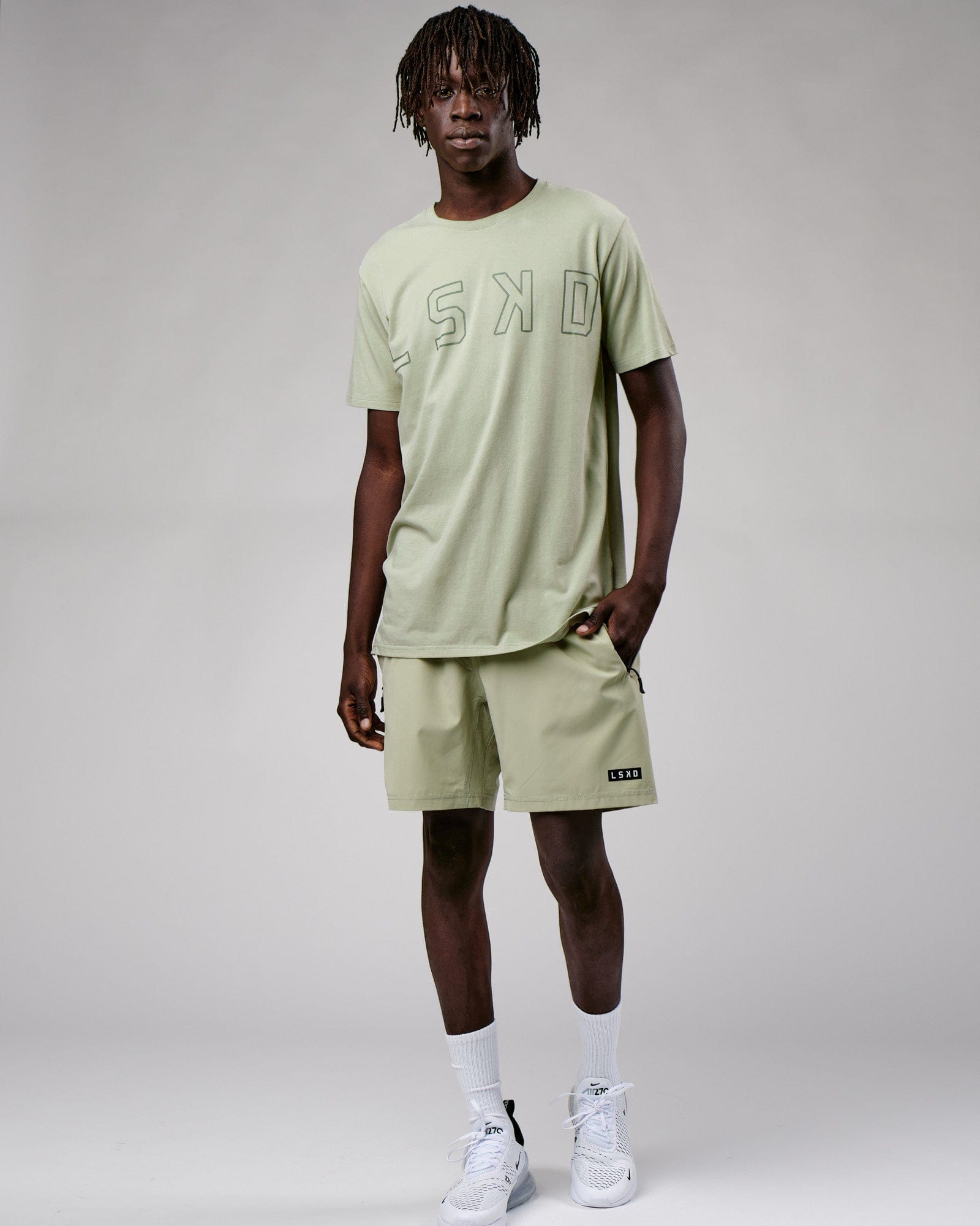 Model wearing Expand FLXCotton Tee - Desert Sage